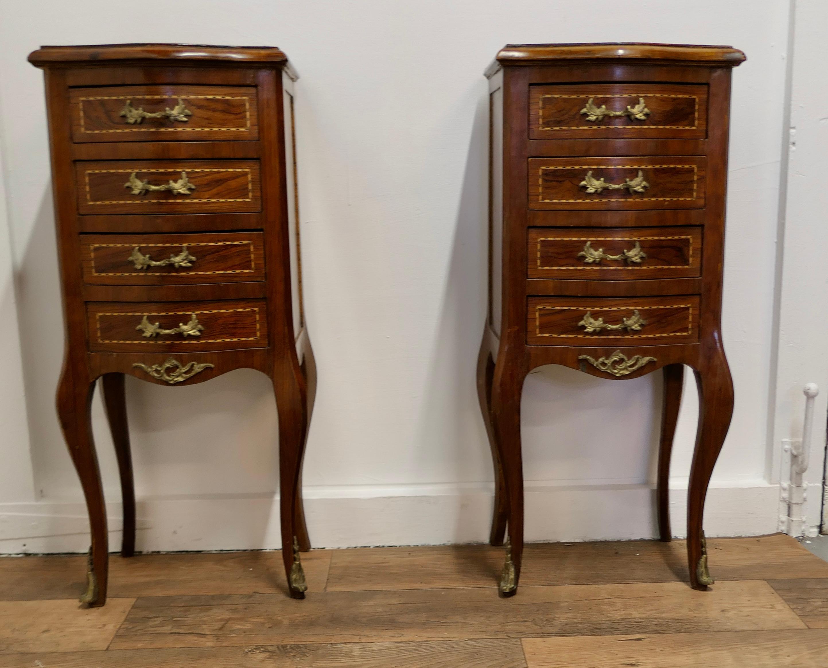 A Pair of French Dainty Four Drawer Ormolu Side Cabinets

These are wonderful little chests, they each have 4 drawers with ormolu handles and decoration 
The drawers run very smoothly and they each stand on neat cabriole legs 
The chests are of