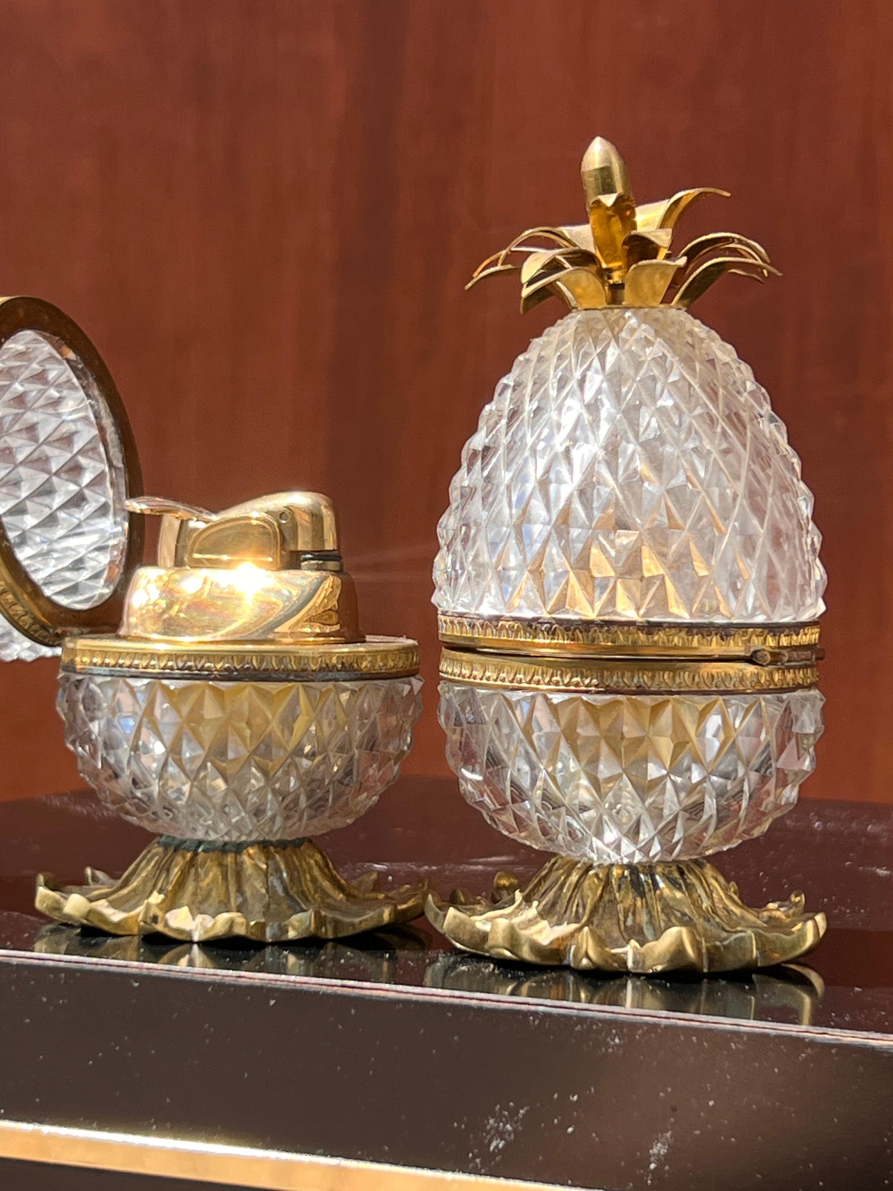 Brass A pair of French déposé crystal pineapple lighters by Baccarat, circa 1950 For Sale