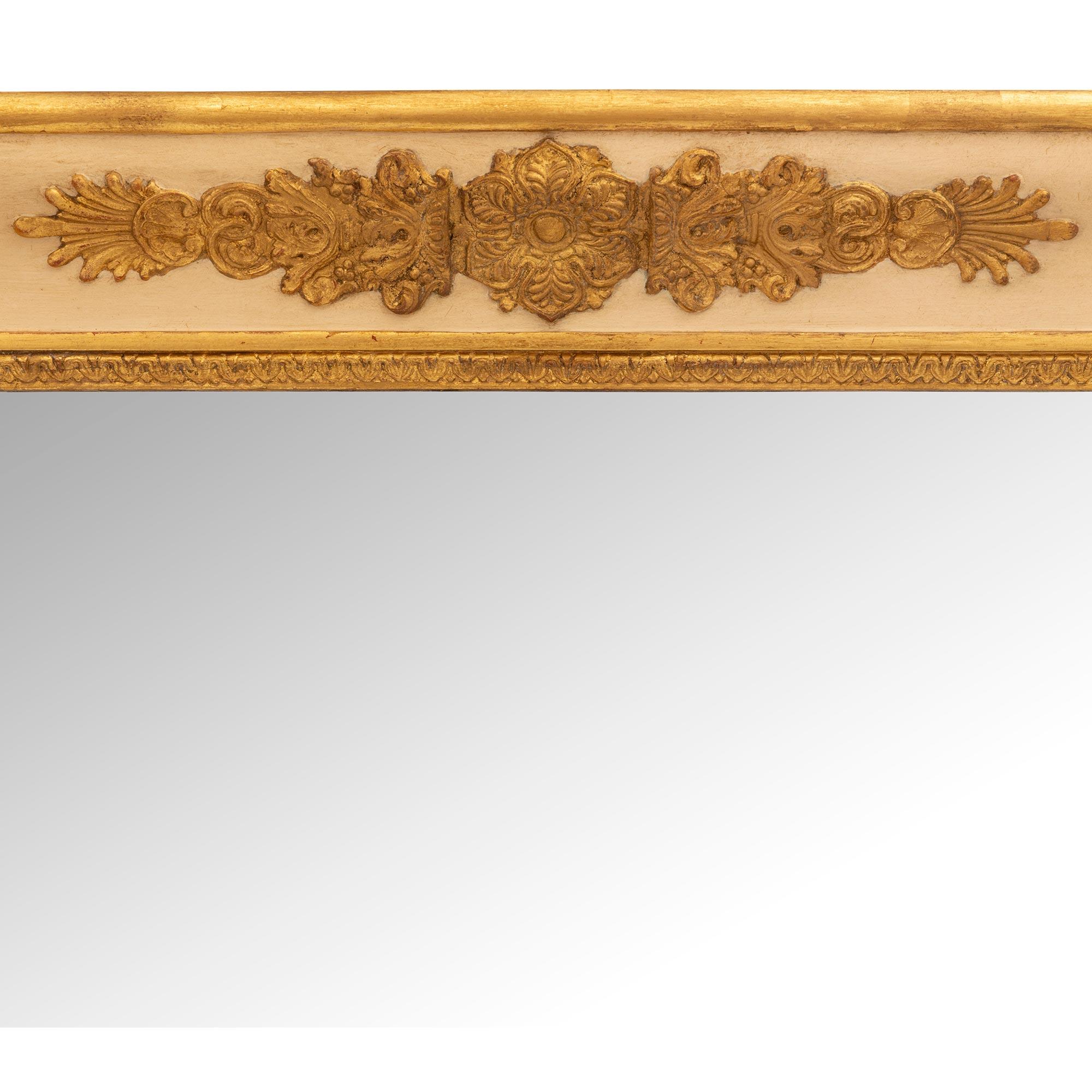 A pair of French early 19th century Empire period giltwood mirrors For Sale 1