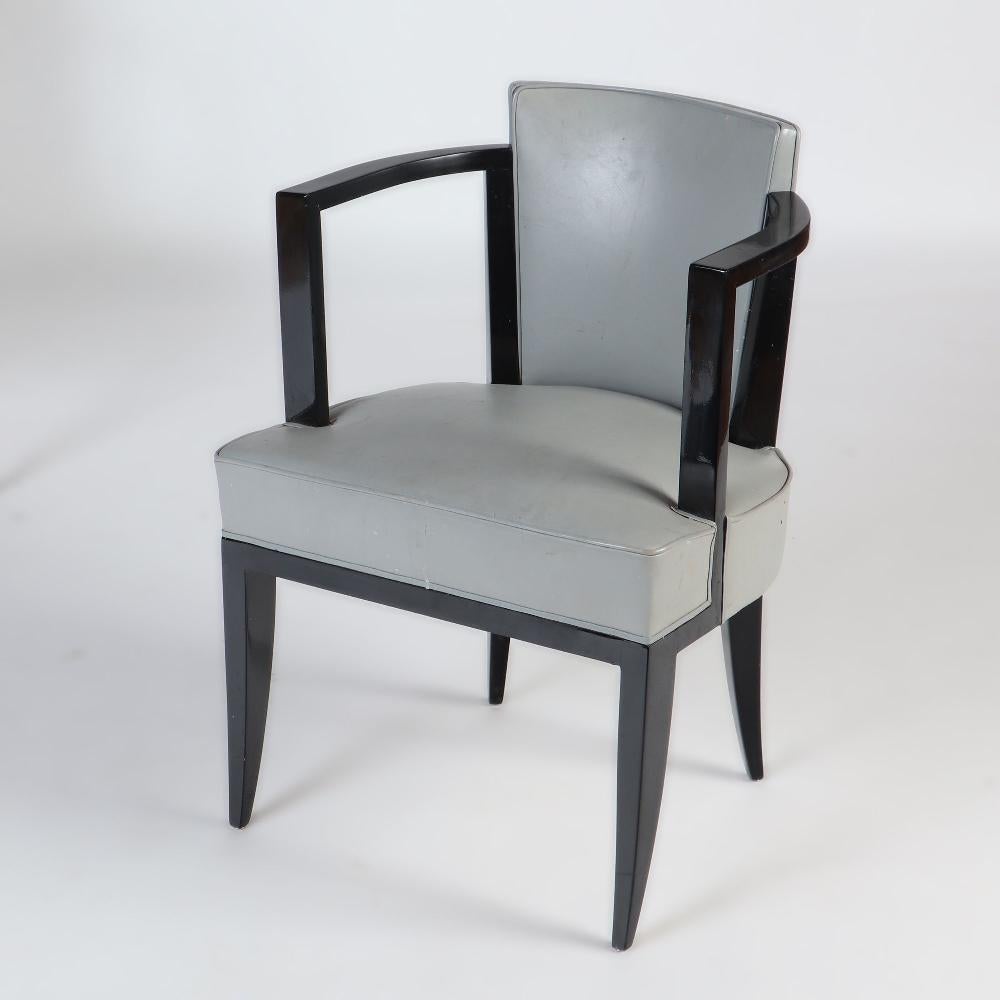 Modern A Pair of French ebonized open armchairs with faux leather upholstery. C 1940 For Sale