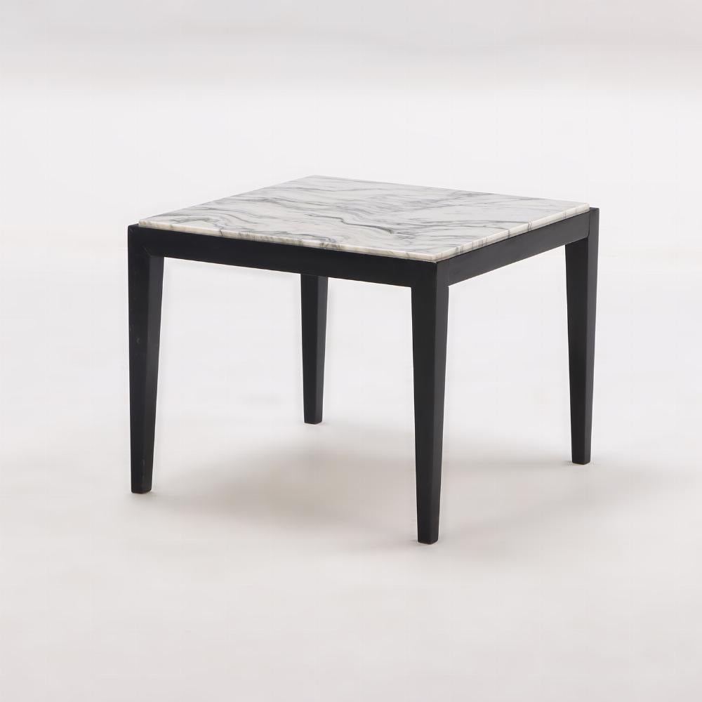 A pair of French ebonized square end tables C 1960, inset with with marble tops with grey veining.