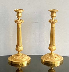Pair of French Empire Gilt Bronze Candle Sticks