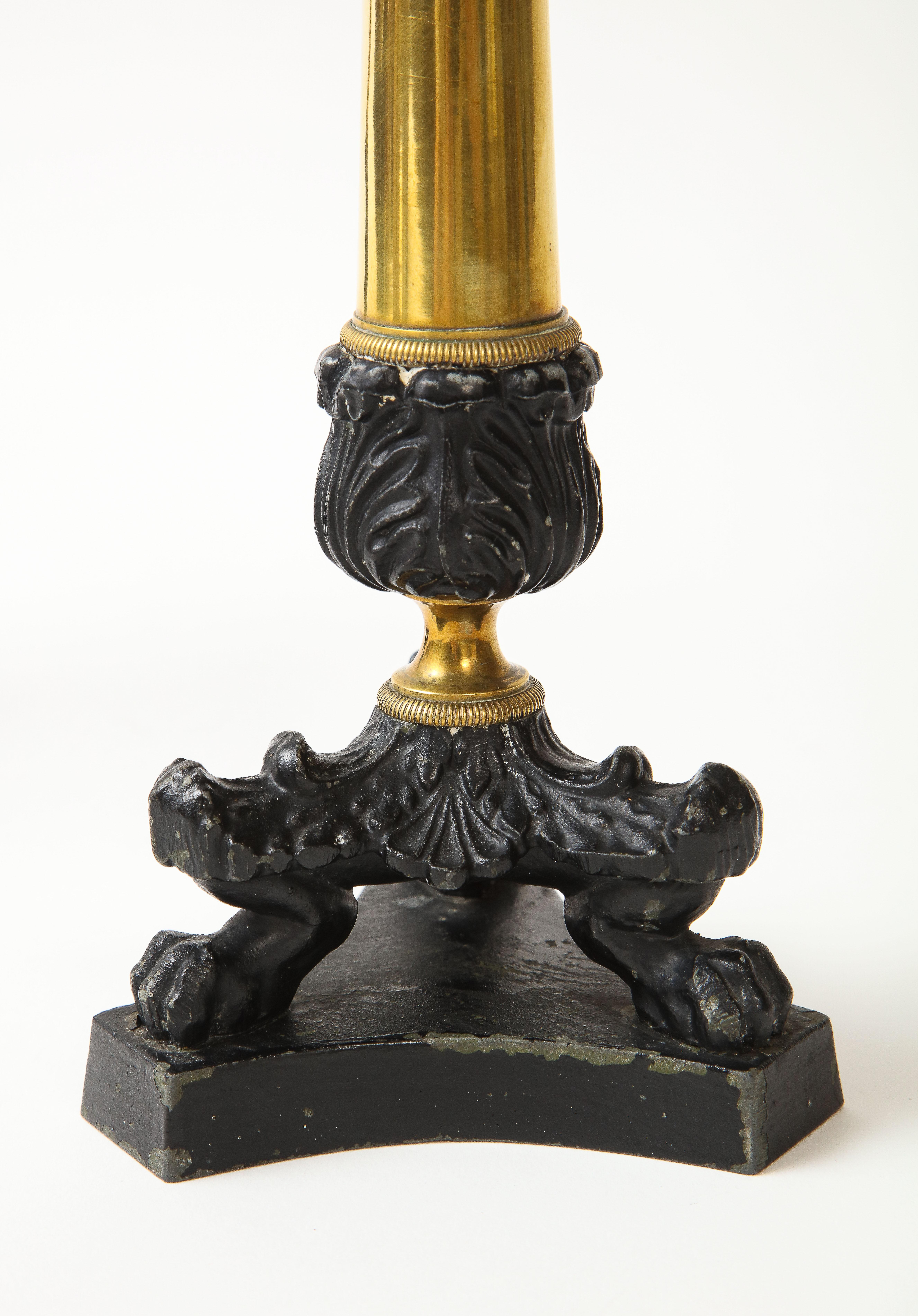 Pair of French Empire Polished Brass and Black-Enameled Cast Iron Candlesticks For Sale 2