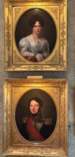 A pair of French Empire portraits of an Aristocratic Couple by Auguste F. Laby