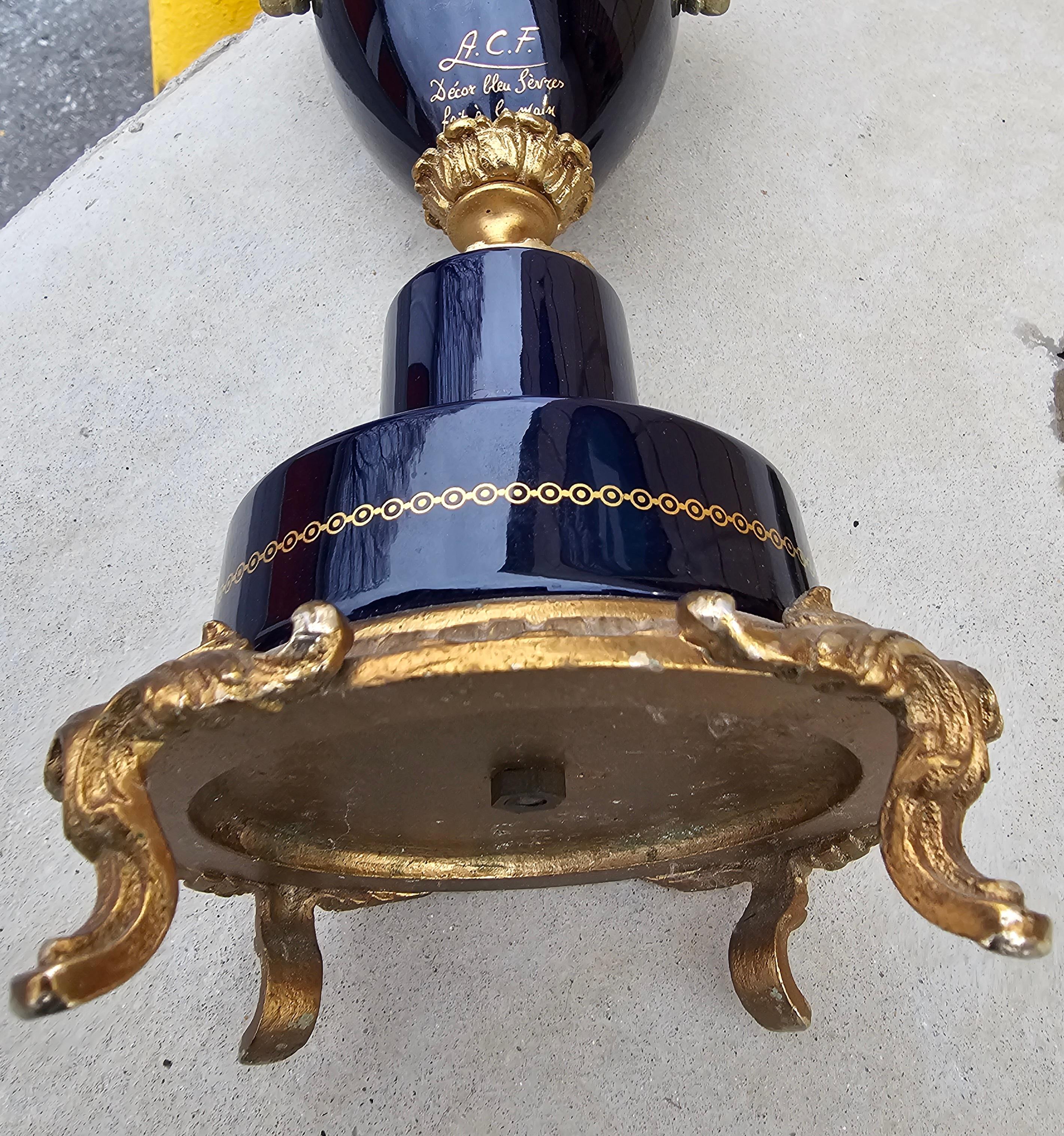 A Pair of  French Empire Sèvres Porcelain Gilt Bronze and Transfer Covered Urns For Sale 4