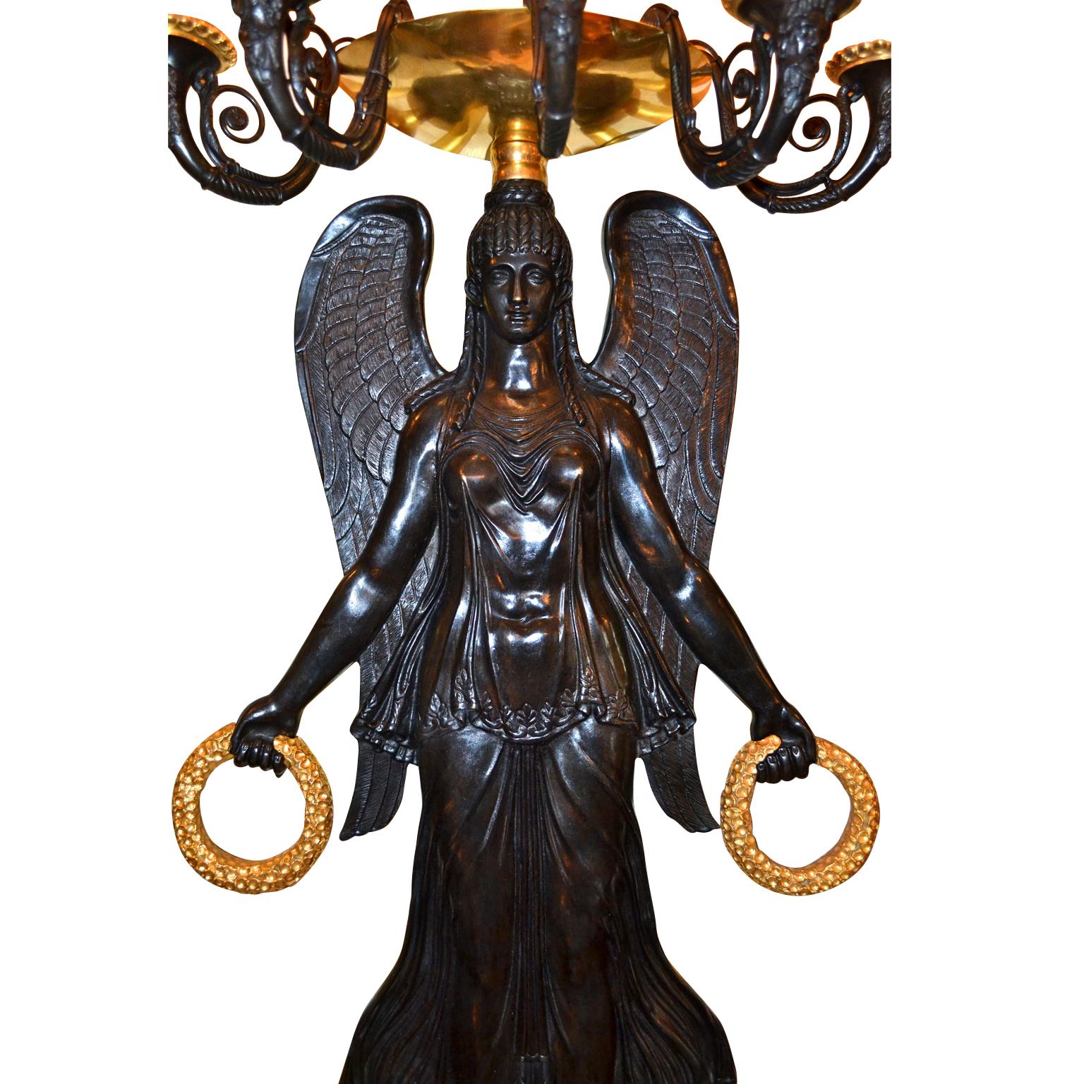 19th Century Pair of French Empire Style Patinated and Gilt Bronze Victory Sconces For Sale