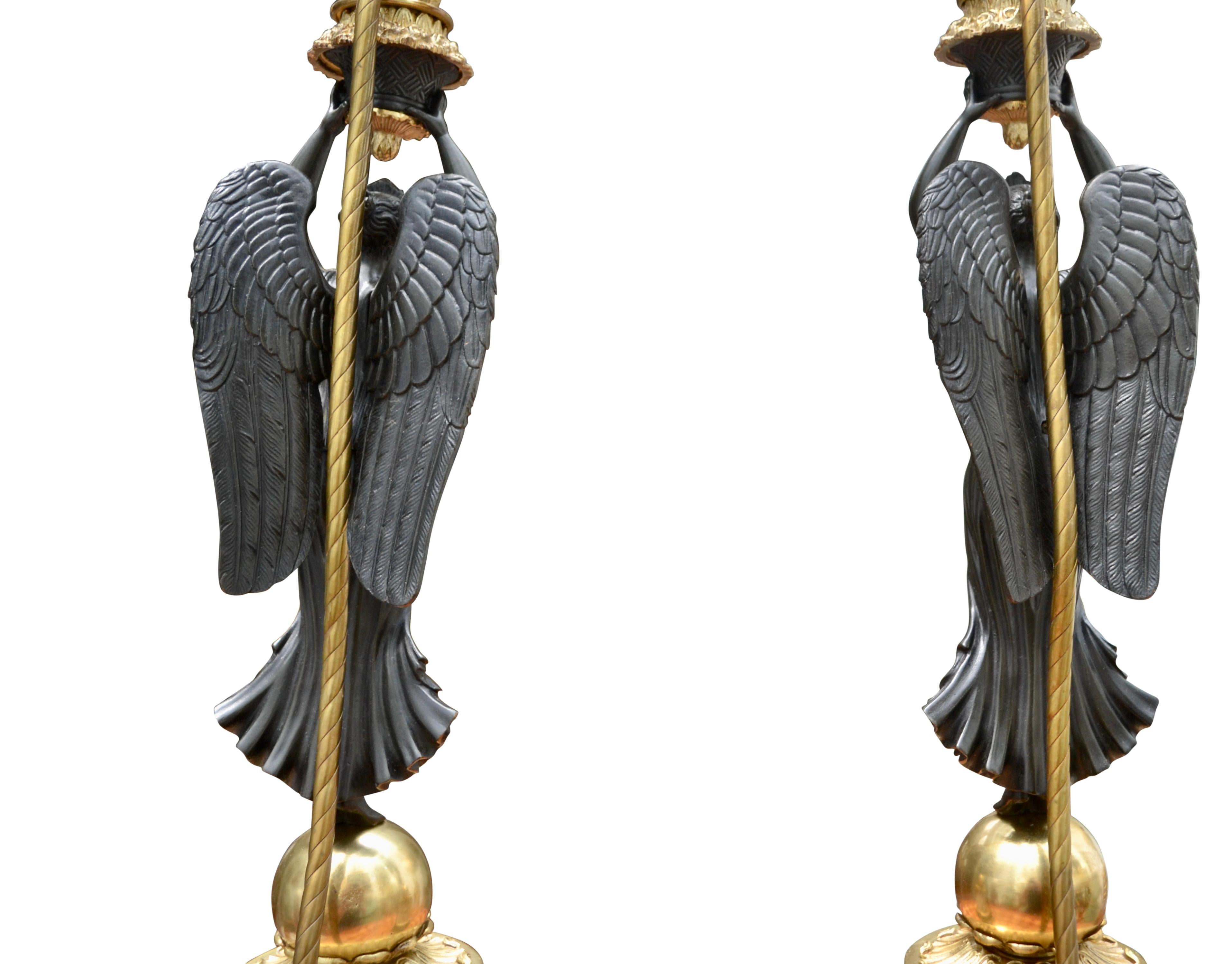 A Pair of French Empire Style Patinated and Gilt Bronze Winged Victory Lamps For Sale 7