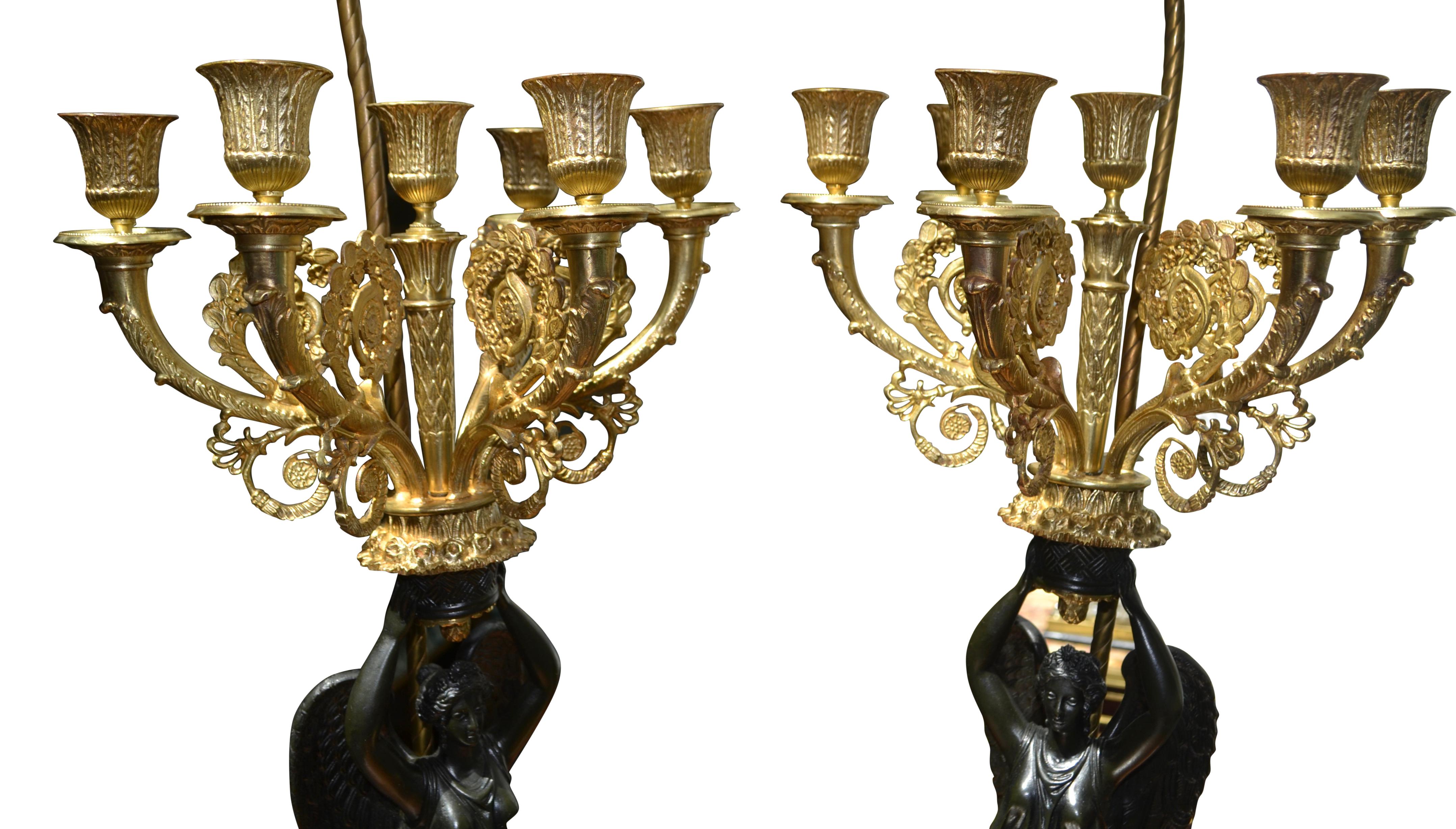 A Pair of French Empire Style Patinated and Gilt Bronze Winged Victory Lamps For Sale 10