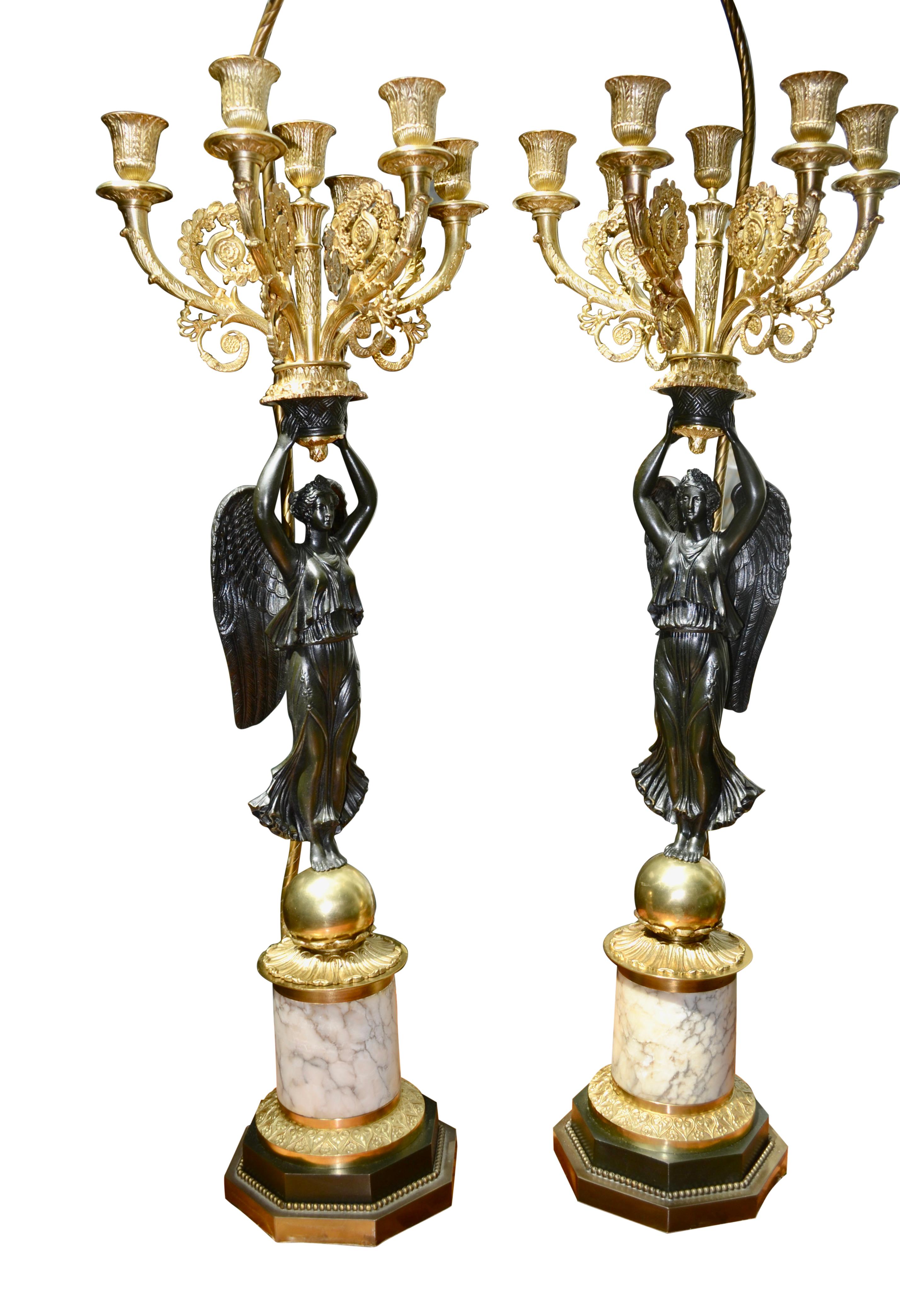 A Pair of French Empire Style Patinated and Gilt Bronze Winged Victory Lamps For Sale 3