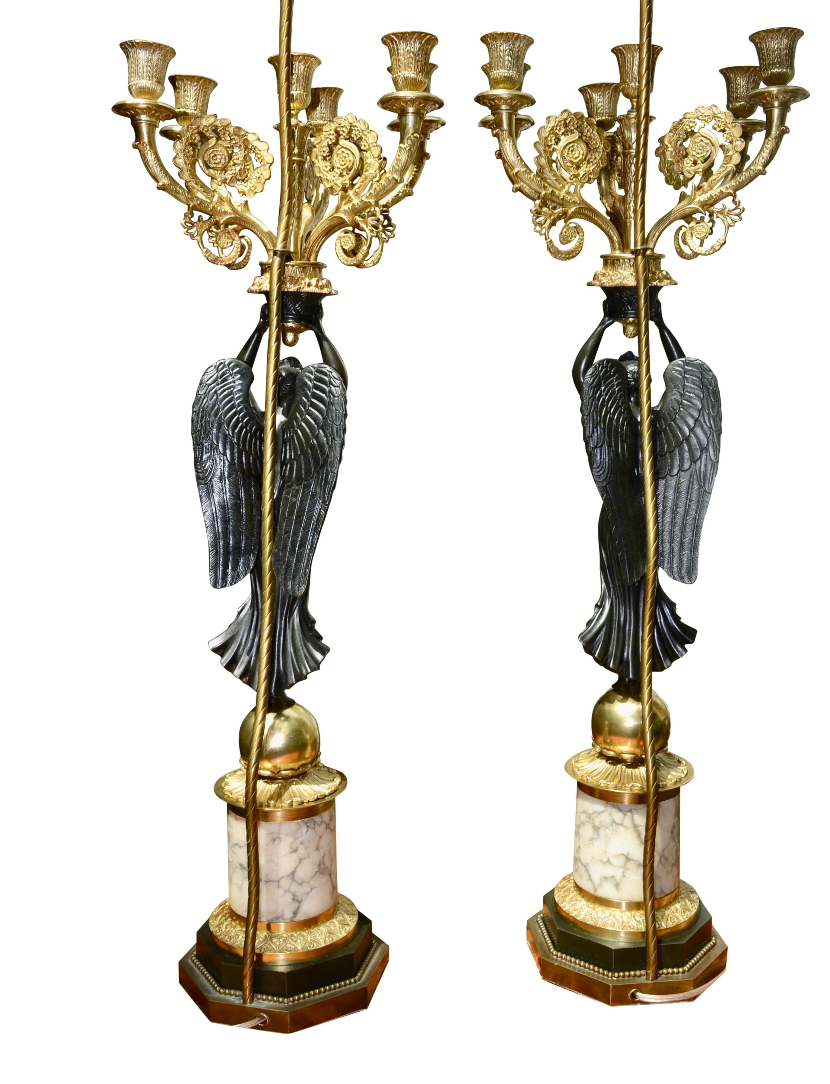 A Pair of French Empire Style Patinated and Gilt Bronze Winged Victory Lamps For Sale 4