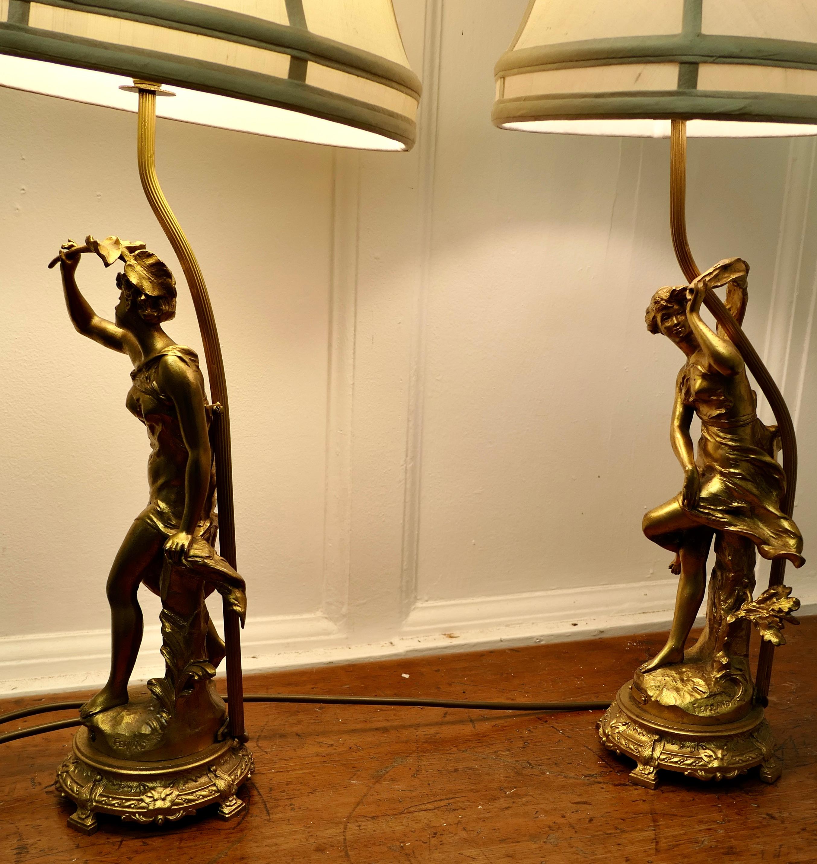 Early 20th Century A Pair of French Figural Brass Lamps, after Ernest Justin Ferrand  A Pair of Fre