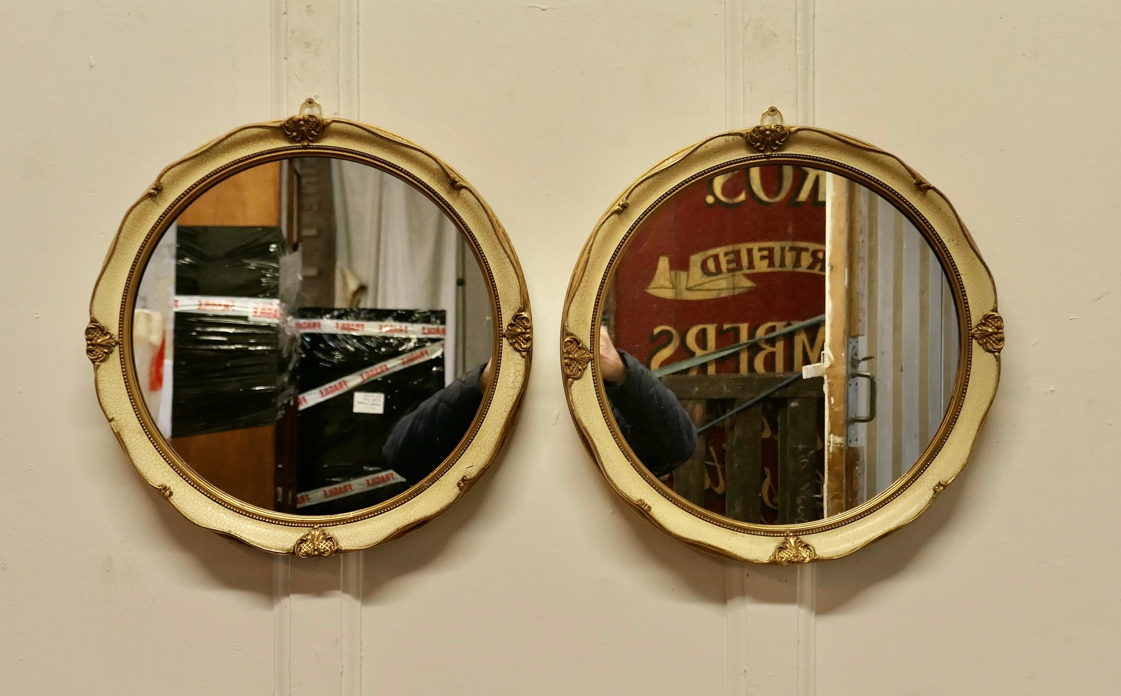 A Pair of French Gilt and Cream Crackle Finish Wall Mirrors

It is unusual to find a pair like this, the mirrors have a decorative cream crackle finish and Gilt frame 
The have a 1.5” wide frame they are in good condition with very minor dings

The