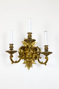 Pair of French Gilt Bronze Wall Sconces with Mascarons, After A.Ch. Boulle