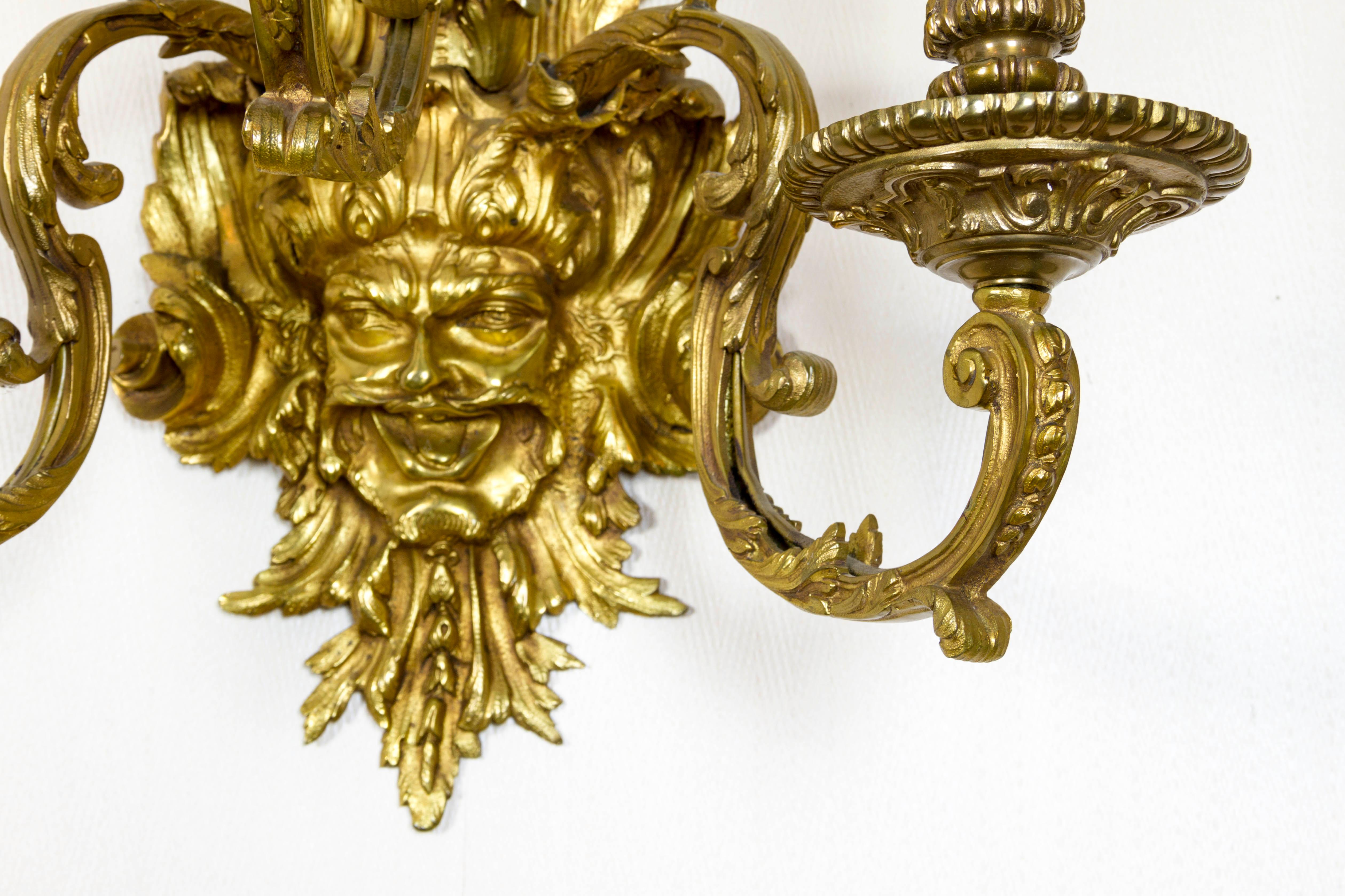Cast Pair of French Gilt Bronze Wall Sconces with Mascarons, After A.Ch. Boulle For Sale