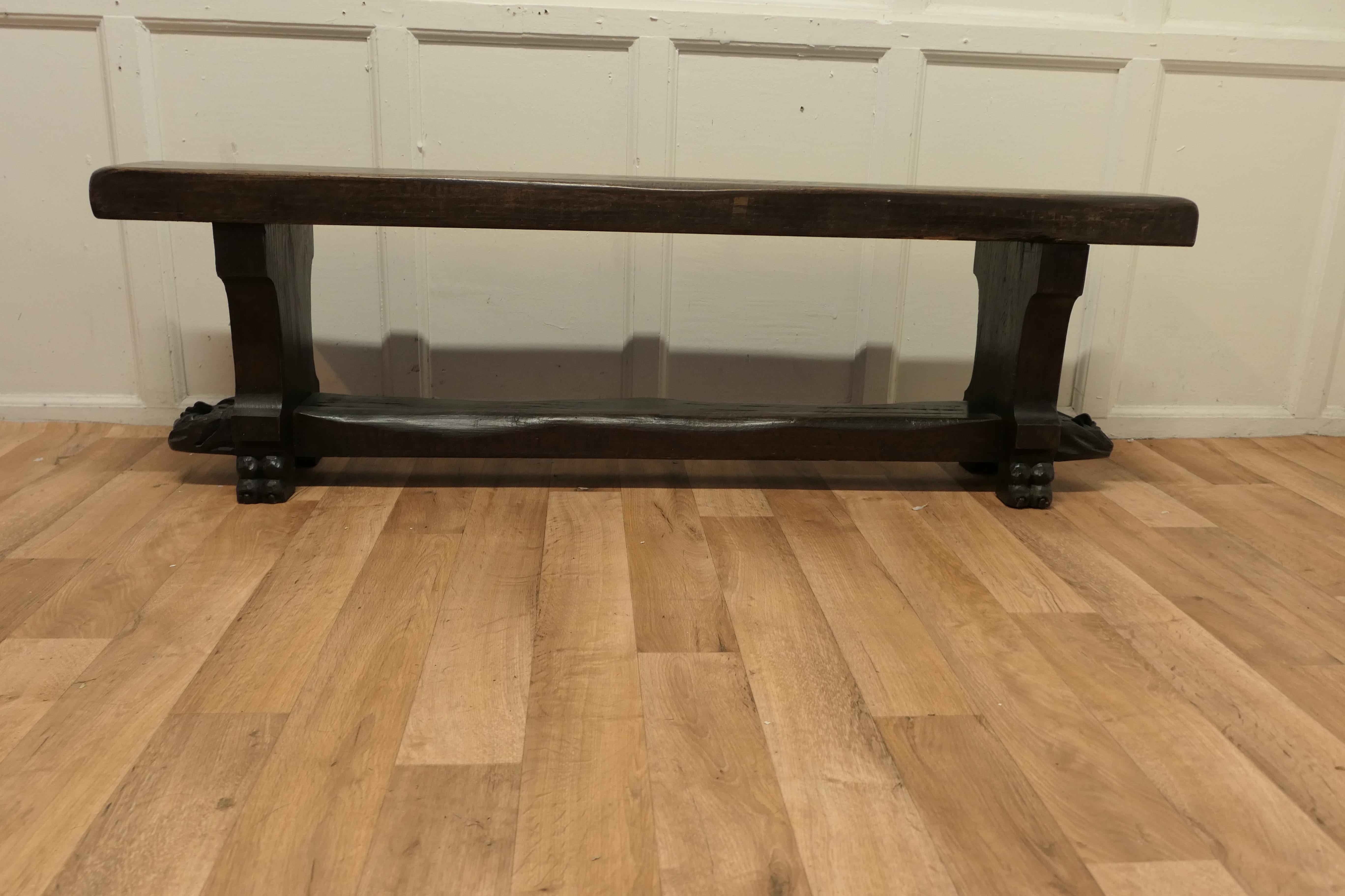 A pair of French Gothic oak monastery benches.

These heavy benches are made in Solid oak the seats are 3” thick and the carved stretchers are 5” wide, each of the ends of the stretchers are individually carved with the face of a medieval monk