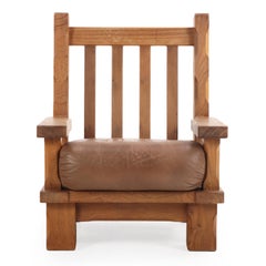 A Pair of French Heavy Oak Brutalist style Open Arm Chairs, C. 1960.