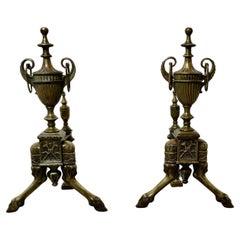 A Pair of French Hunting Theme Brass Andirons or Chenets