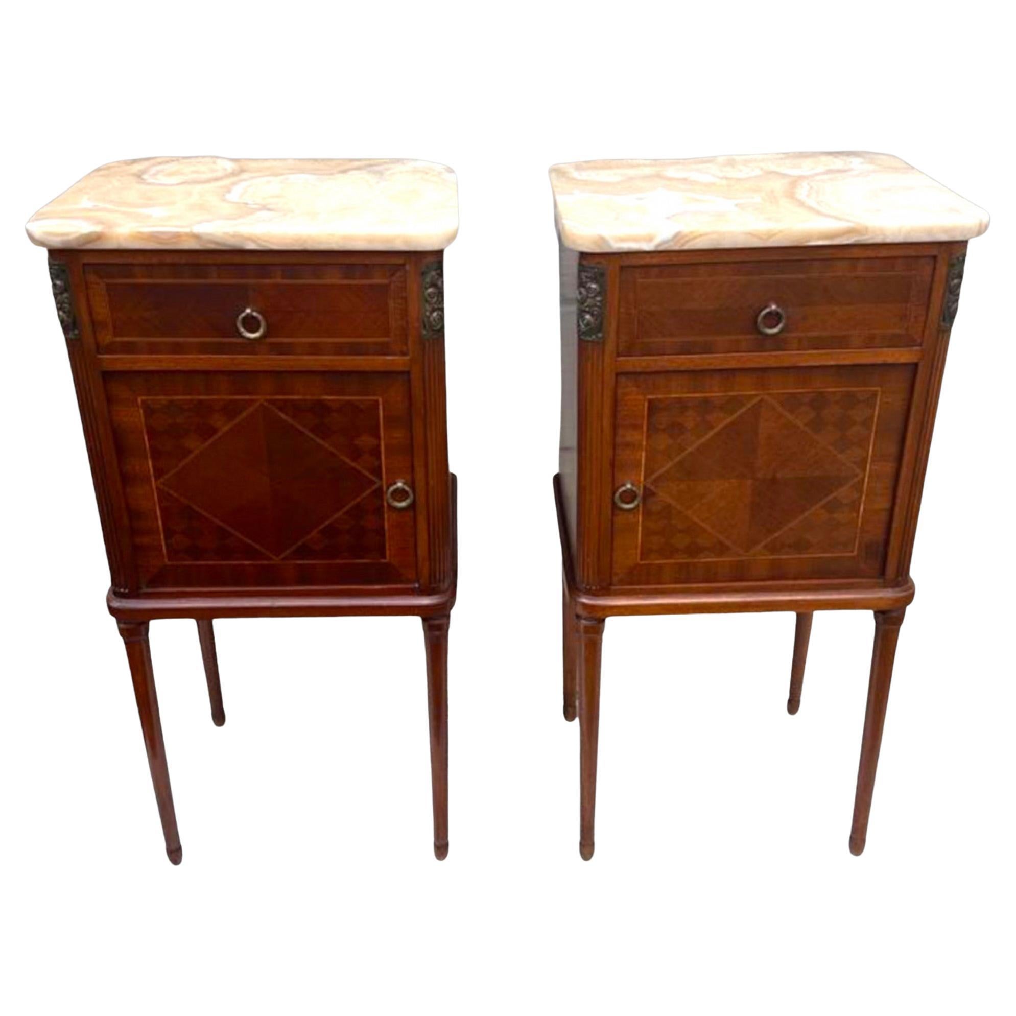 A Pair of French Inlaid Mahogany Bedside Tables