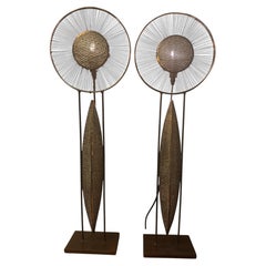 A pair of French iron & brass sunburst table lamps