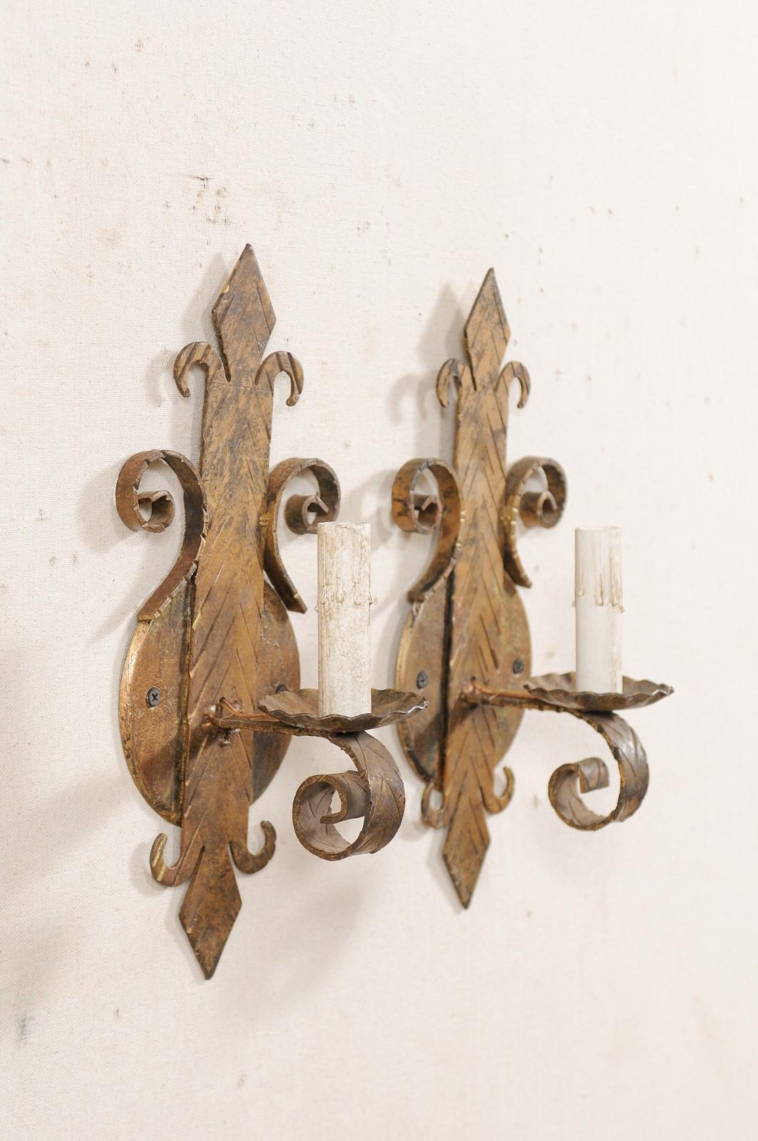 Spanish Pair of French Iron Fleur-de-Lys Sconces in Gold Tones For Sale