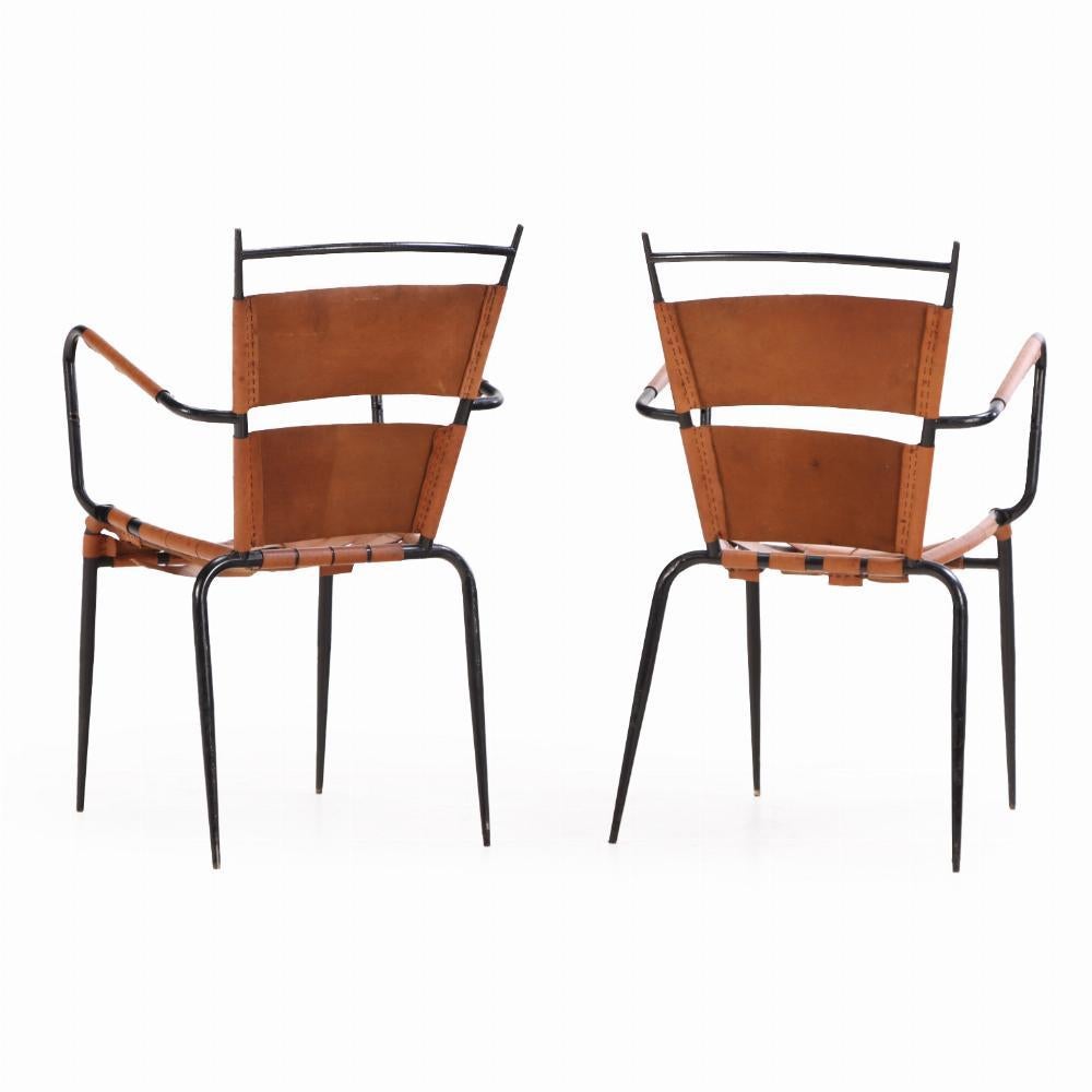 Mid-Century Modern A Pair of French iron & leather armchairs in manner of Jacques Adnet, C. 1950 For Sale