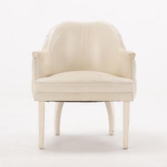 A pair of French leather club chairs C 1970.
