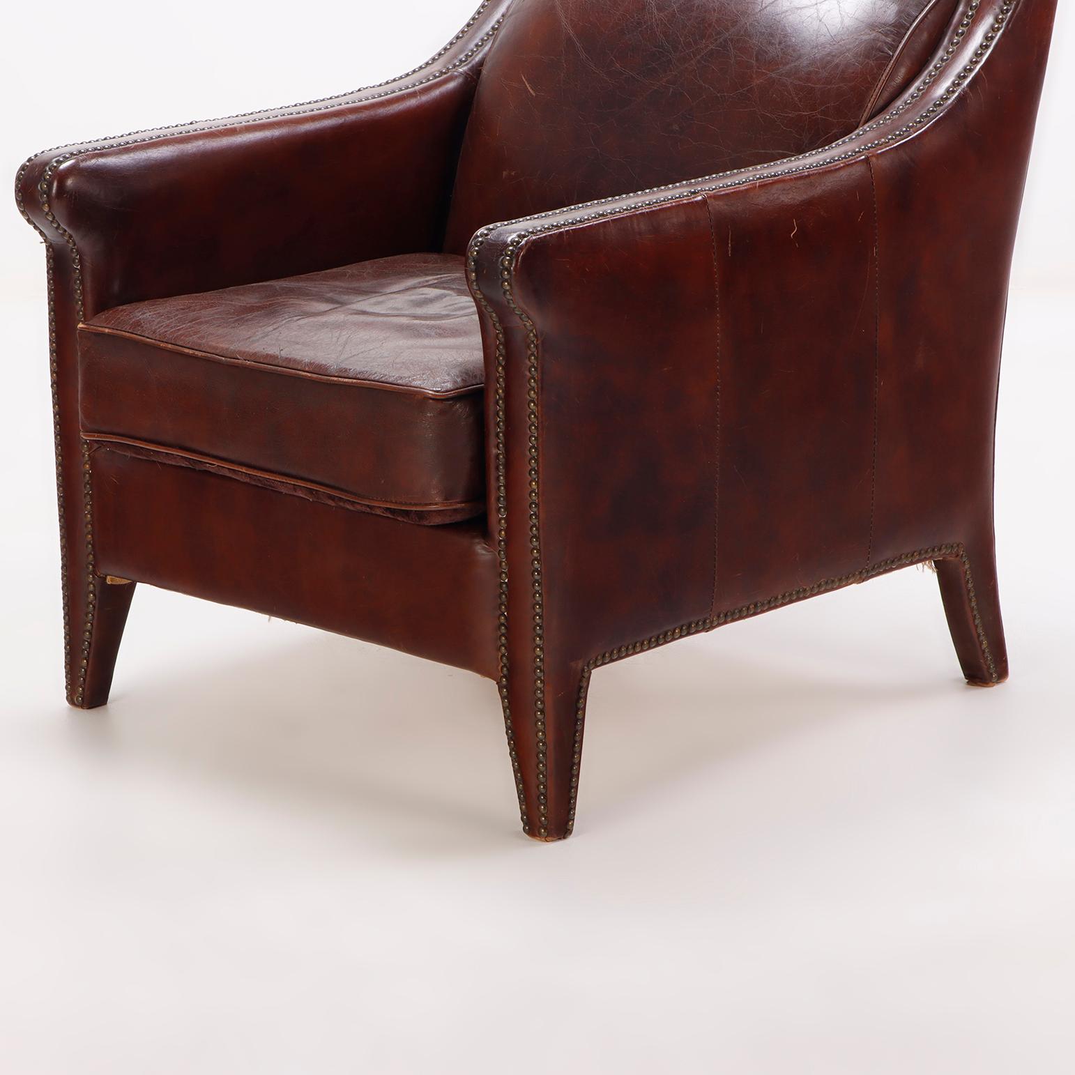 Late 20th Century A pair of French leather club chairs circa 1970.