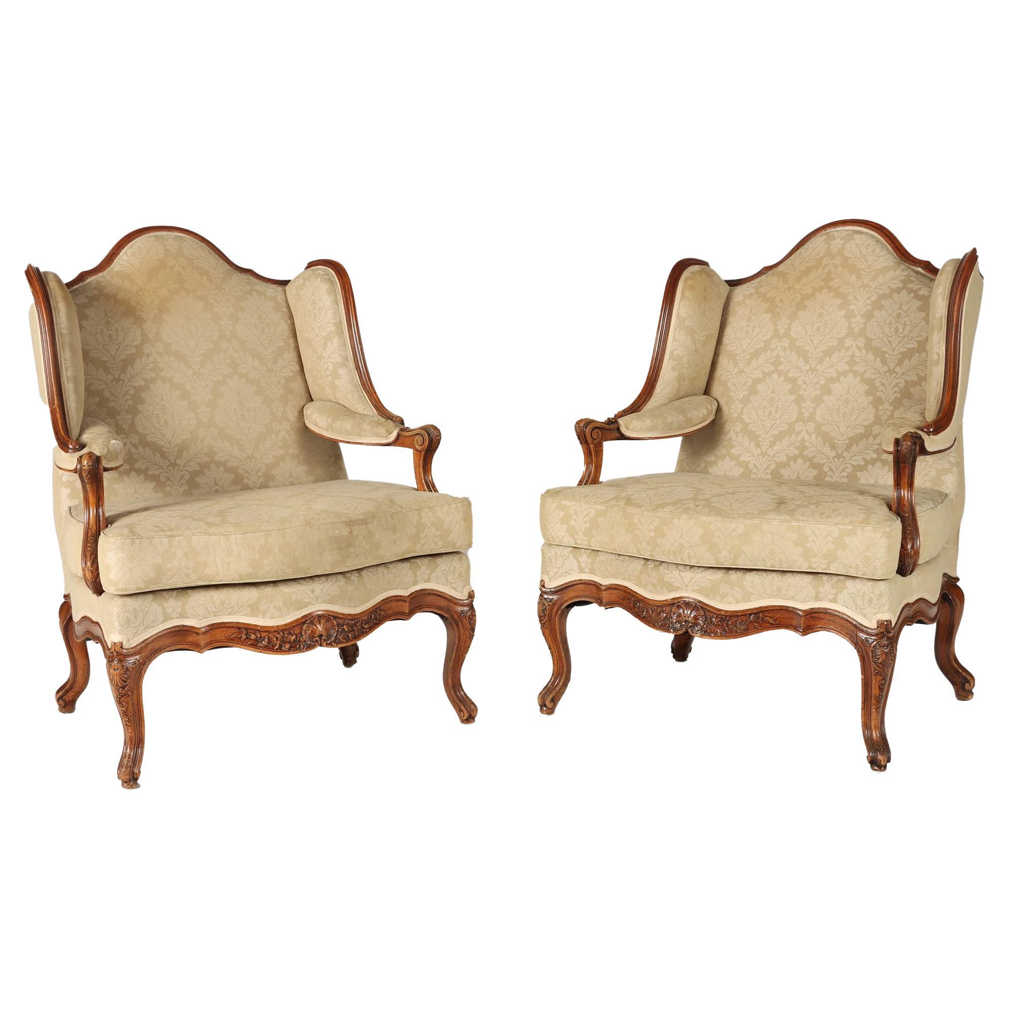 Pair of French Louis XV Style Carved Bergeres a Oreilles, C 1900