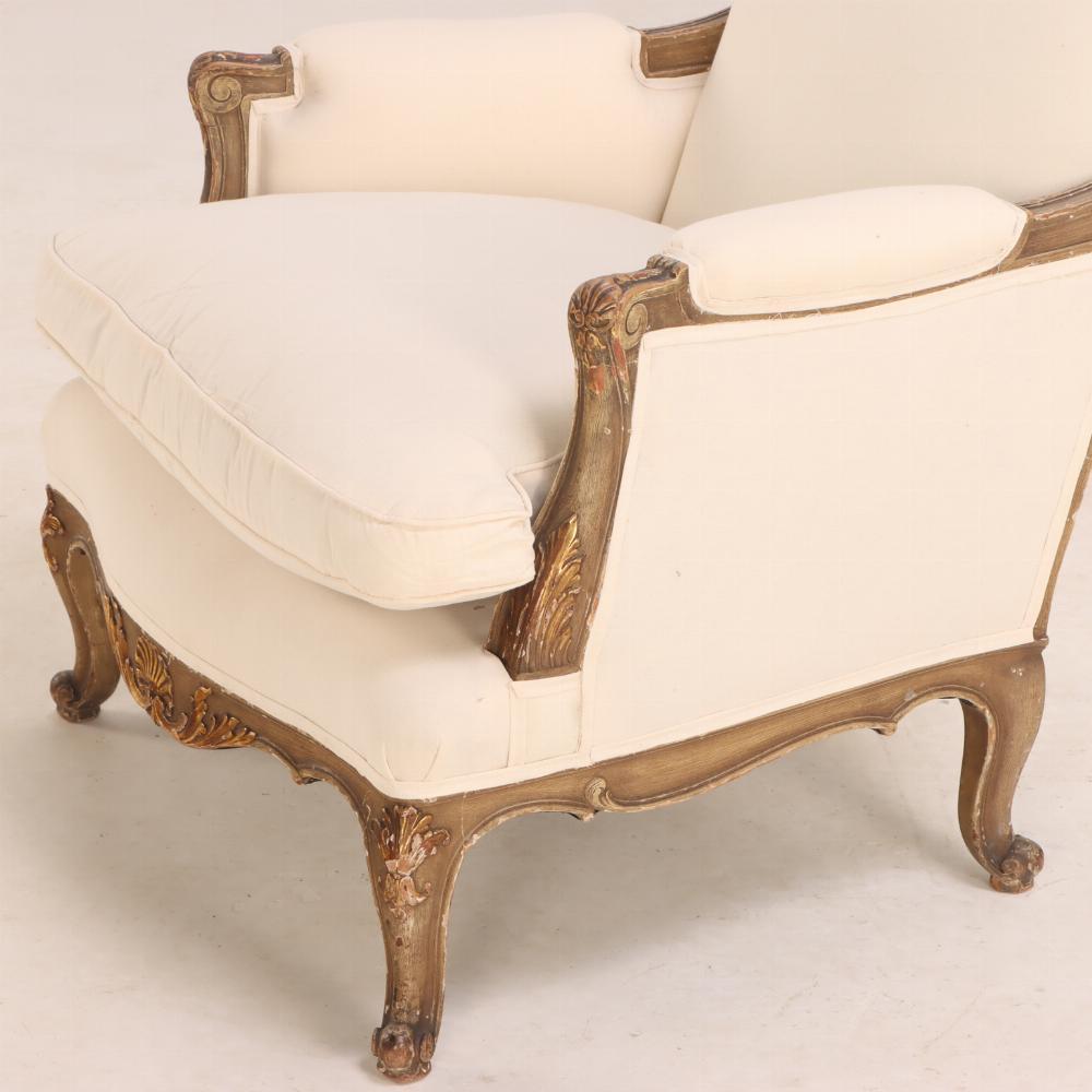 20th Century A Pair of French Louis XV style painted and giltwood bergere chairs, C 1940. For Sale