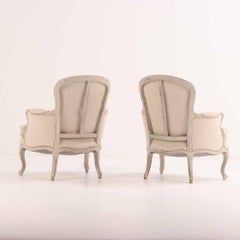 A pair of French Louis XV style painted armchairs, C. 1920.