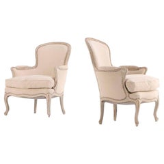 A pair of French Louis XV style painted armchairs, C. 1920.