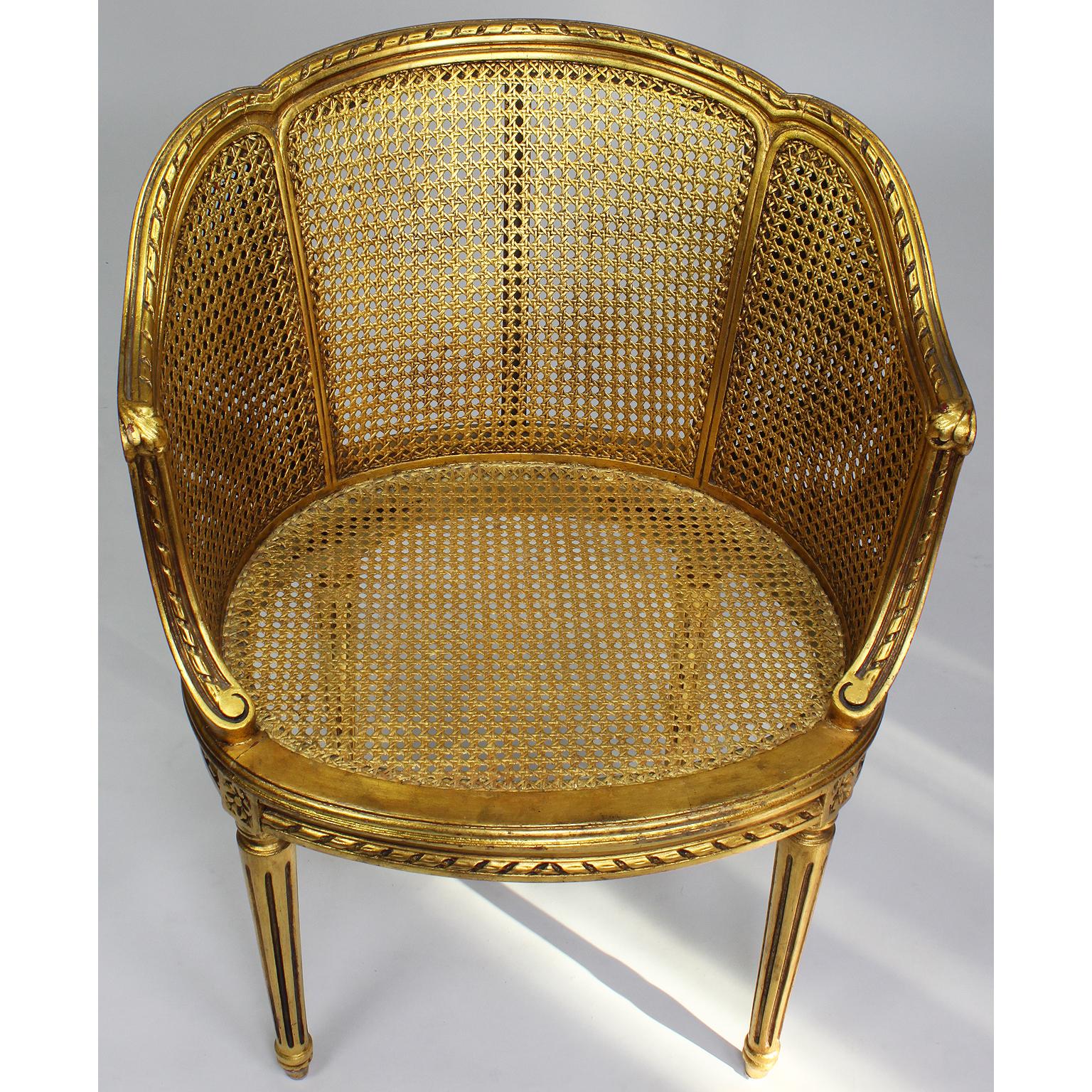 Pair of French Louis XVI Style Giltwood Carved and Cane Fauteuils Armchairs In Good Condition In Los Angeles, CA