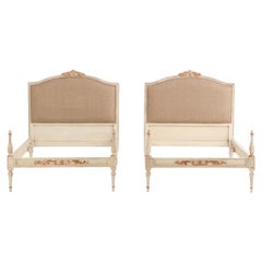 A pair of French Louis XVI style painted twin beds, C. 1940.