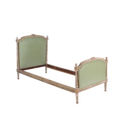 A Pair of French Louis XVI style painted twin beds circa 1900.