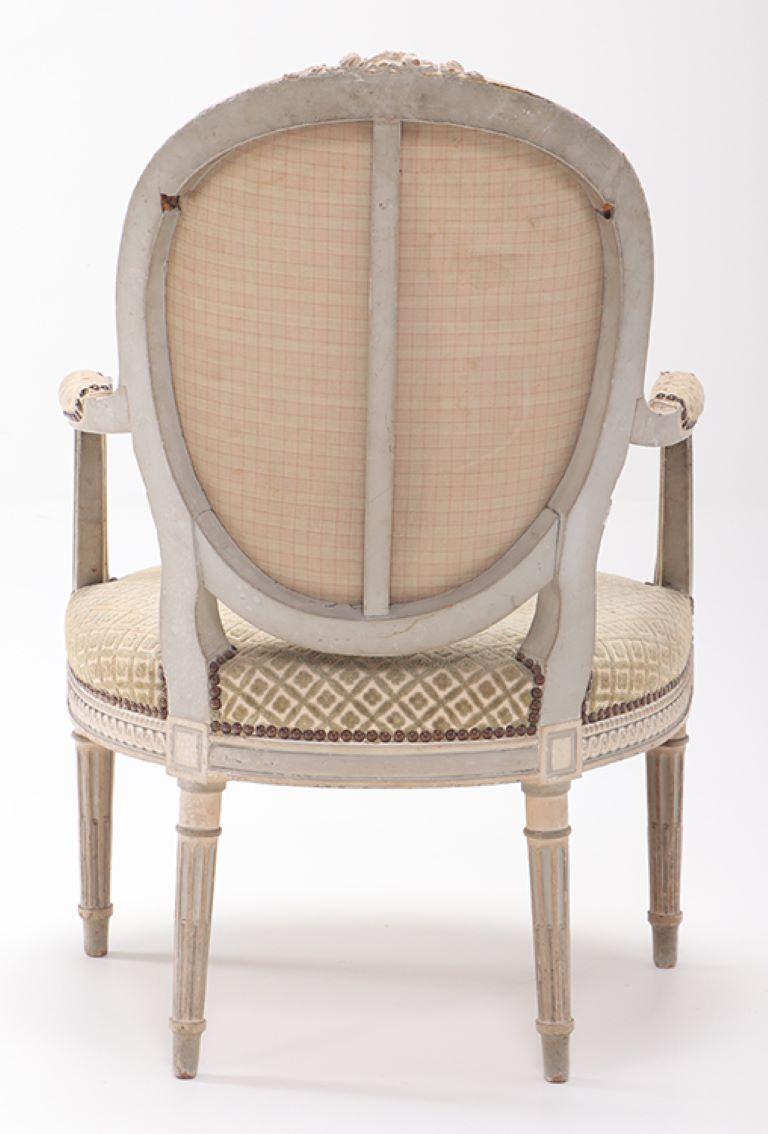 Upholstery A pair of French Louis XVI style relief carved open armchairs circa 1860. For Sale