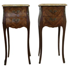 A Pair of French Marquetry Bombe Bedside Cabinets
