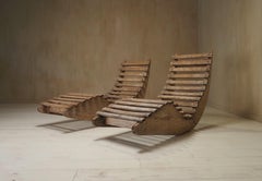 A pair of French Mid Century lounge chairs
