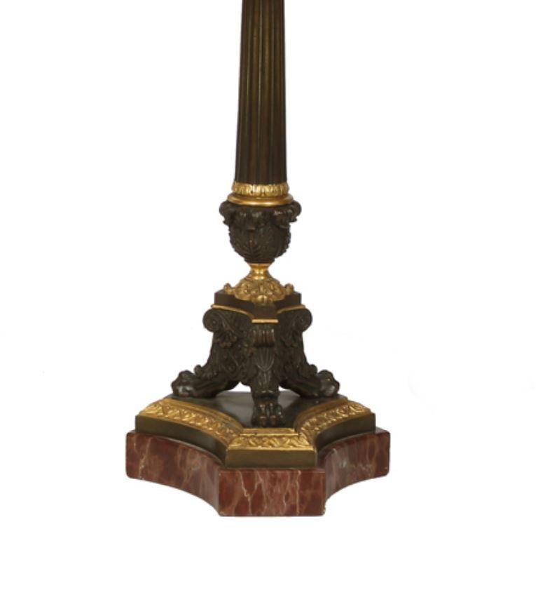 Pair of French Napoleon Bronze and Gilt Metal Candlestick Lamps In Good Condition For Sale In Locust Valley, NY