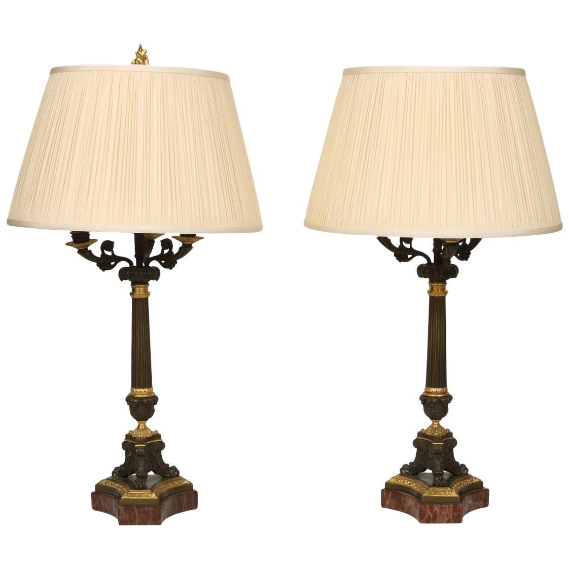 Pair of French Napoleon Bronze and Gilt Metal Candlestick Lamps