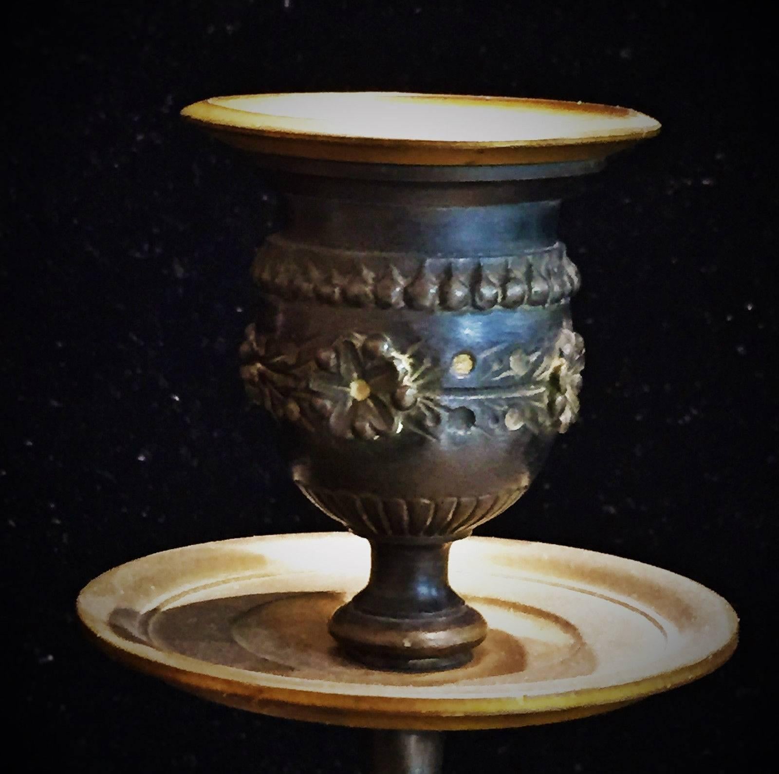 These 19th century candleholders are a fine example of the style that was domineering in the applied arts during Napoleon III reign in France i.e. Second French Empire - the period between the Second and the Third Republic. The Bonapartist regime of