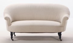 Pareja de sofás franceses Napoleón III con respaldo corrido hacia 1860.