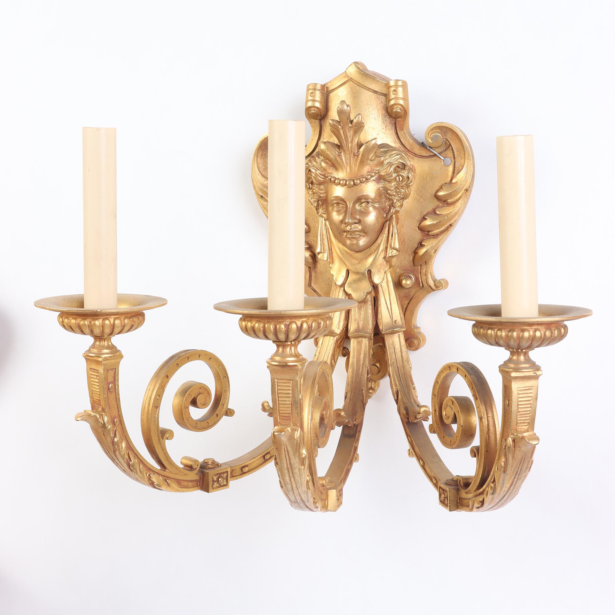 Pair of French Neoclassical Style Gilt Bronze Sconces Having Classical Masks In Good Condition For Sale In Philadelphia, PA