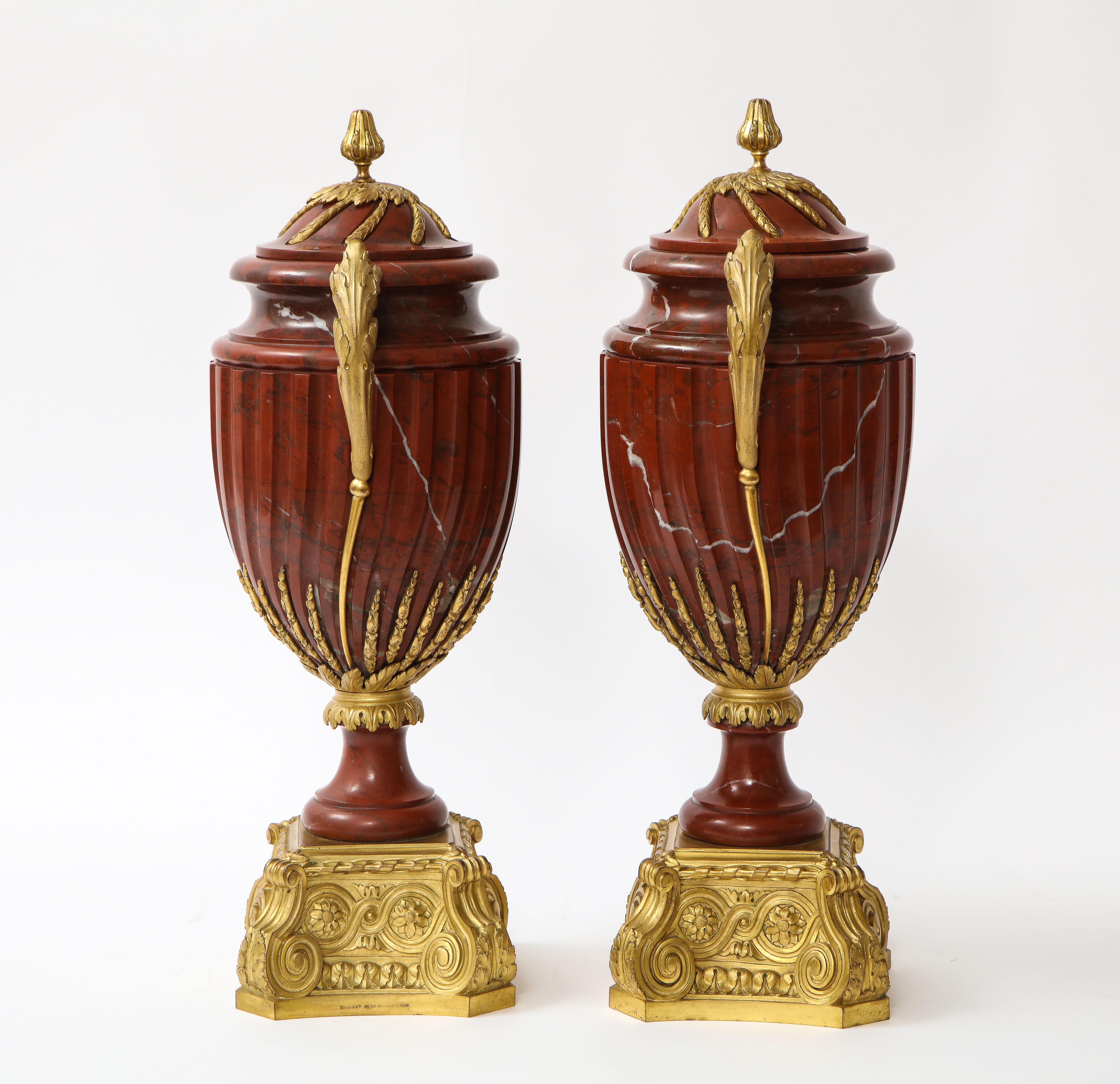 Louis XVI Pair of French Ormolu Mounted Rouge Marble Covered Vases, Signed Maison Boudet For Sale