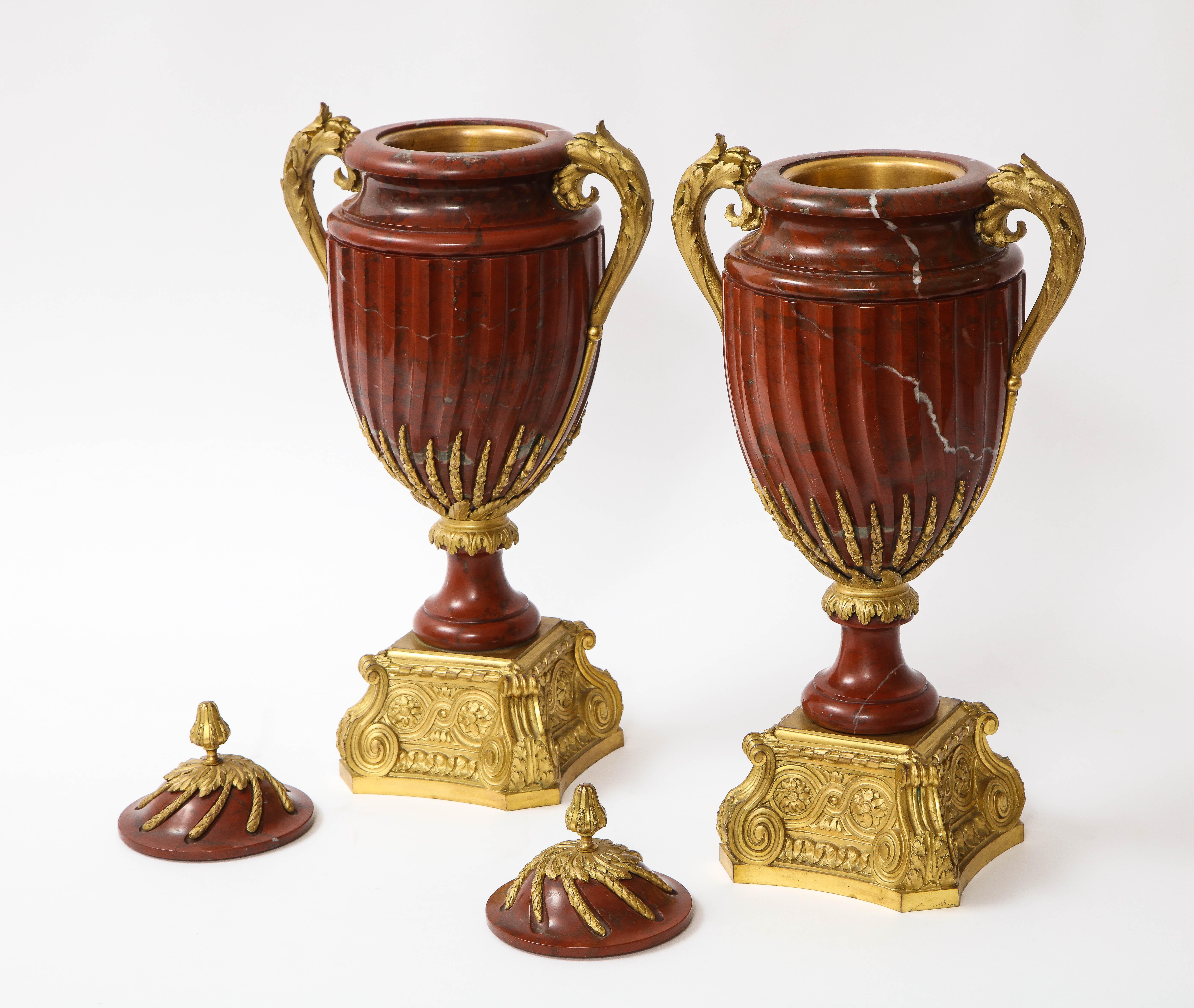 Hand-Carved Pair of French Ormolu Mounted Rouge Marble Covered Vases, Signed Maison Boudet For Sale