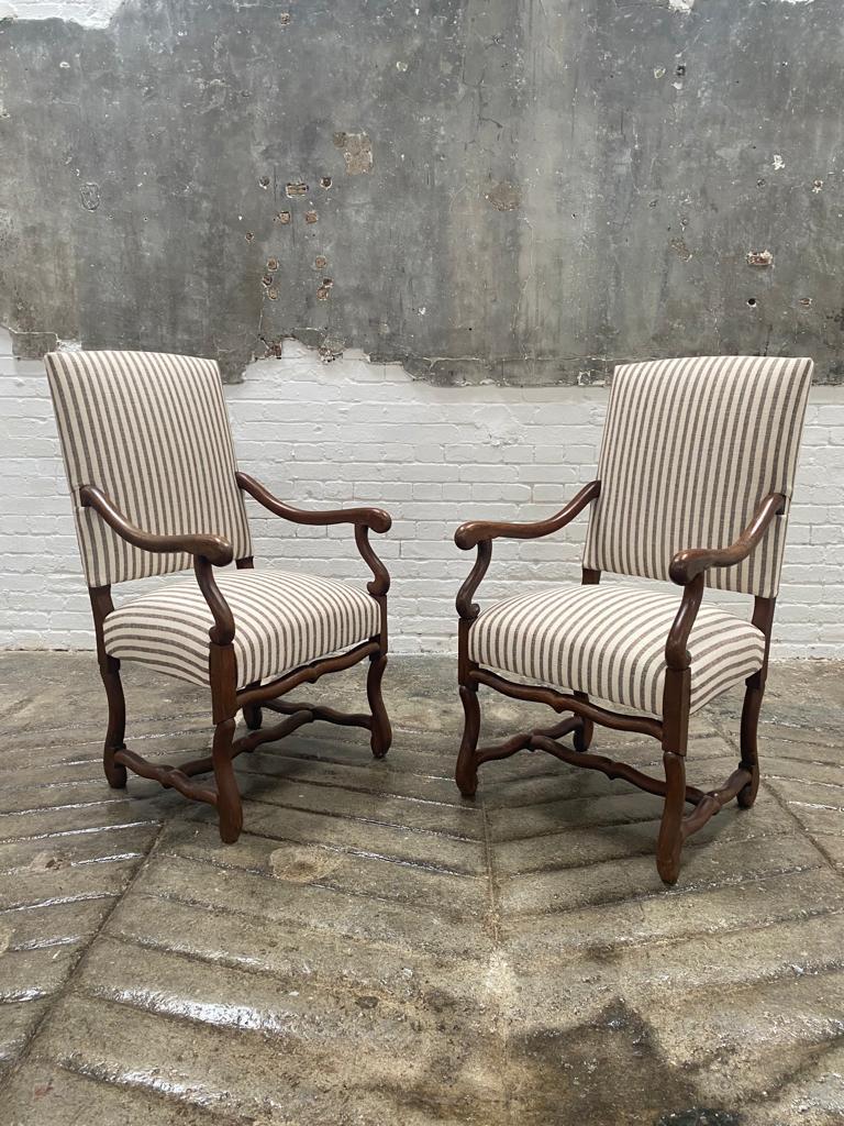 A pair of large 19th century os de mouton open armchairs

A very well made high quality pair of armchairs, having generous proportion and form with square pegged joints. Made from French oak, these have a wonderful warm tone, a decorative pair that