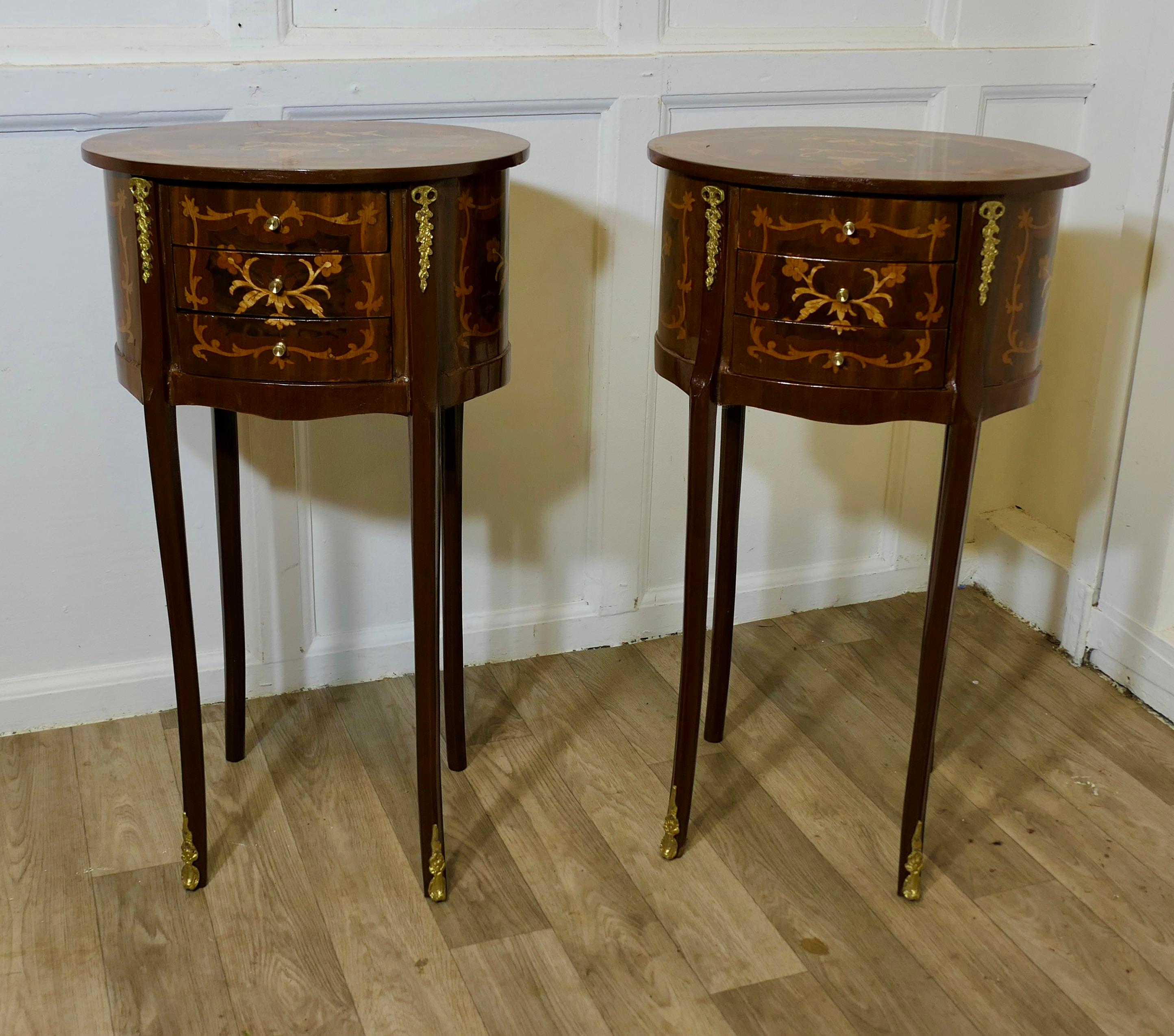 A Pair of French Oval Side Tables or Bedside Cabinets  

This is a superb quality pair of French side tables, they each have 3 small drawers to the front with ormolu mounts on the feet and on both sides of the drawers
These superb pieces are in good