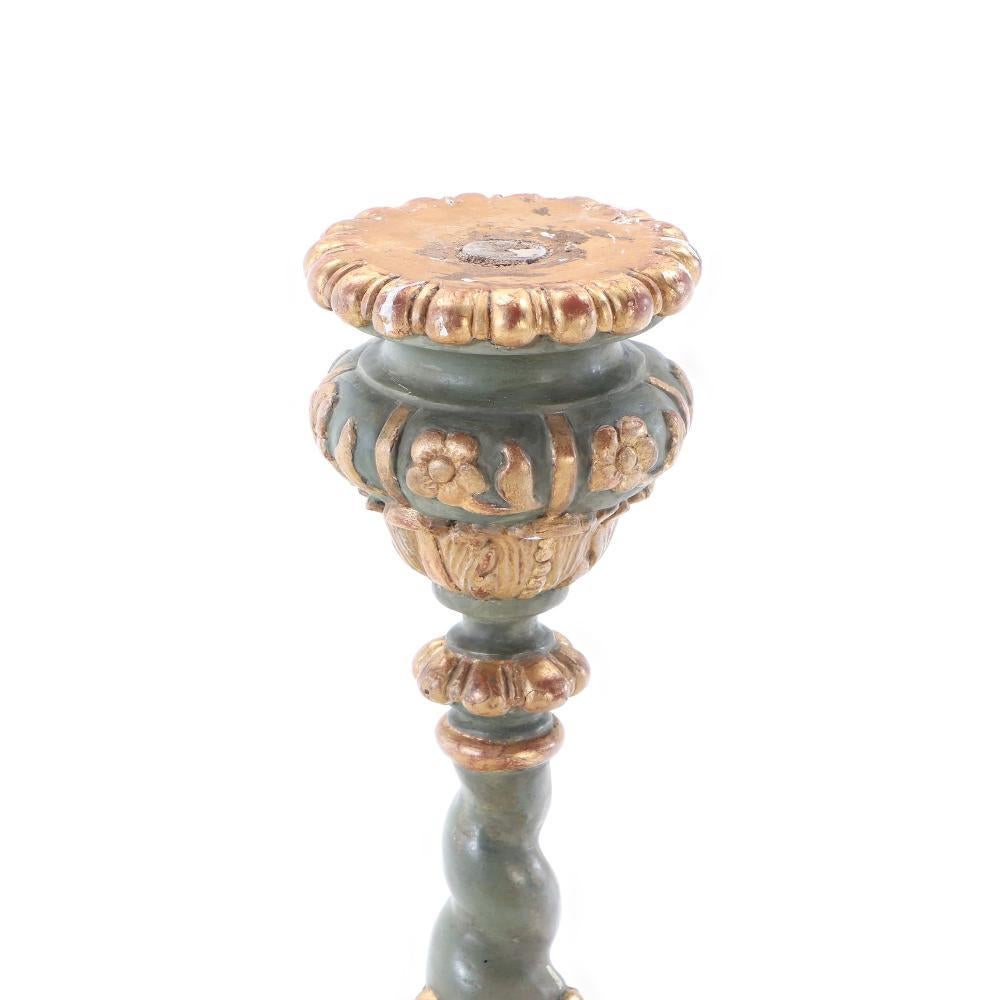 19th Century A pair of French painted and giltwood altar candlesticks, C 1820.