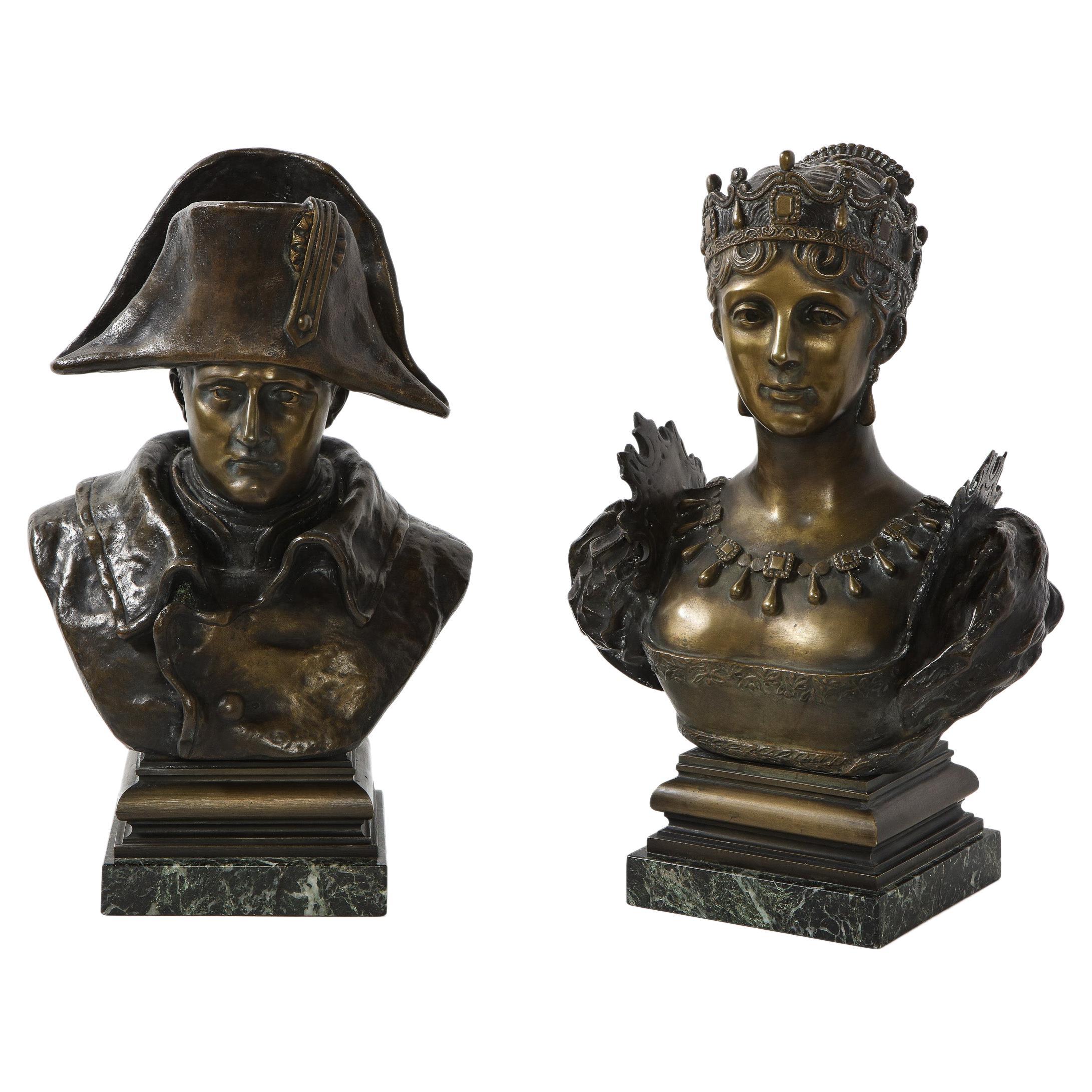A pair of French patinated bronze busts of Napoleon and Empress Josephine, on green marble bases, late 19th century.

Very nice quality, and a good pair of sculptures for any room.

Measures: 17