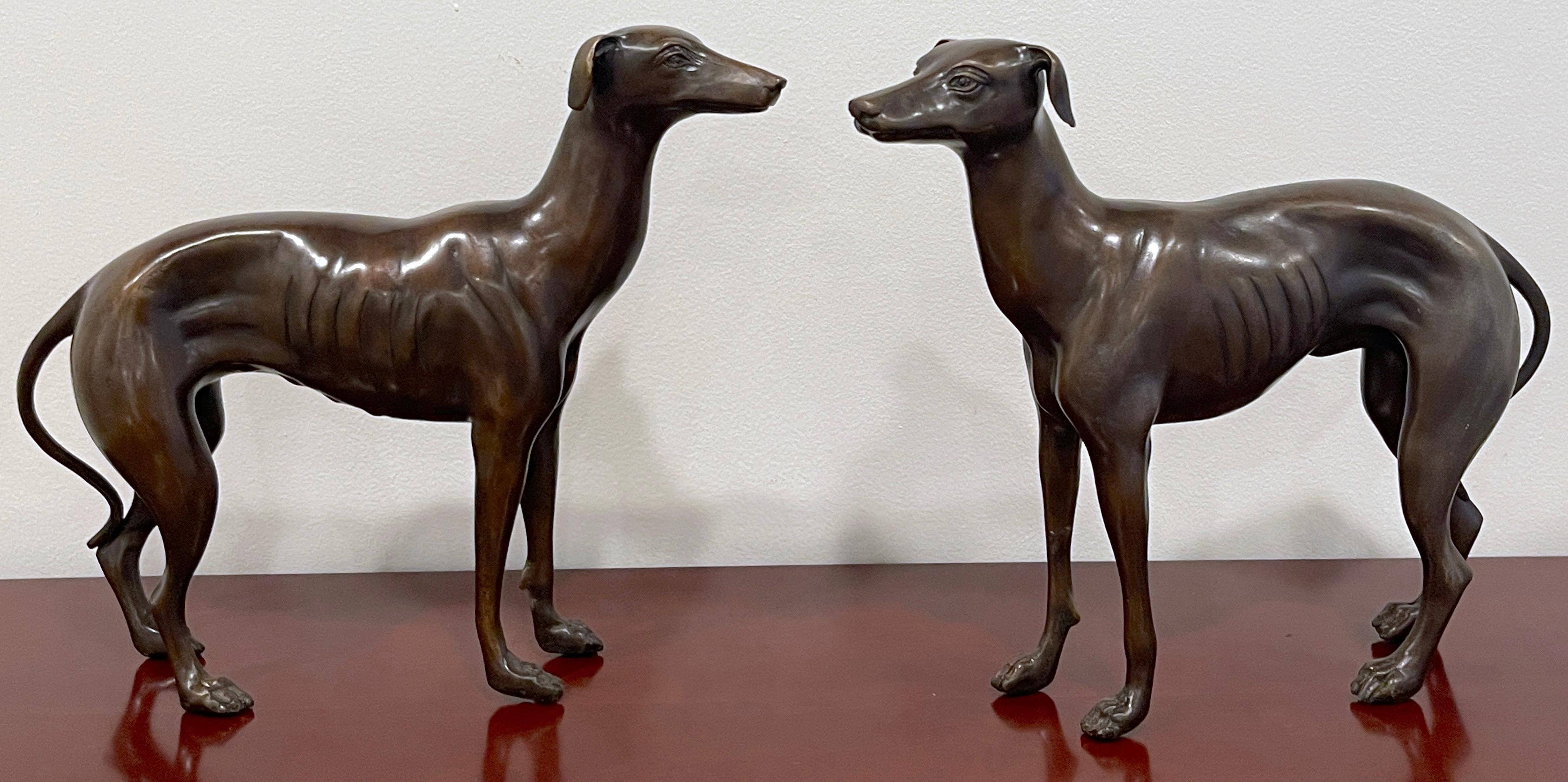 A pair of French patinated bronze models of whippets
France, 1960s
A rare find, each one realistically cast and modeled, a true pair, the female facing right, the male facing left. Showing influences of the French sculptor Pierre Jules Mene