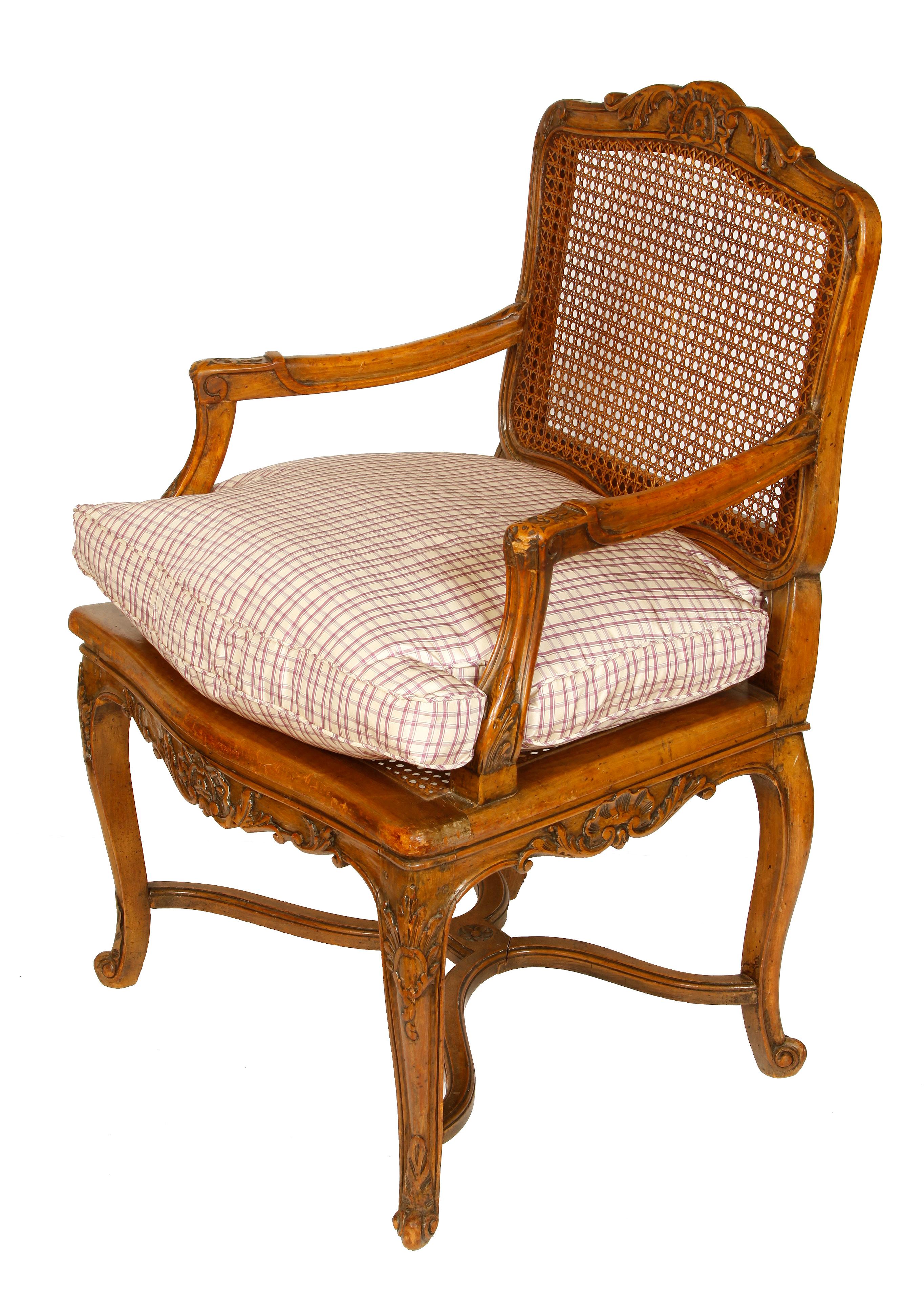Pair of French Provincial Caned Armchairs In Good Condition For Sale In Locust Valley, NY